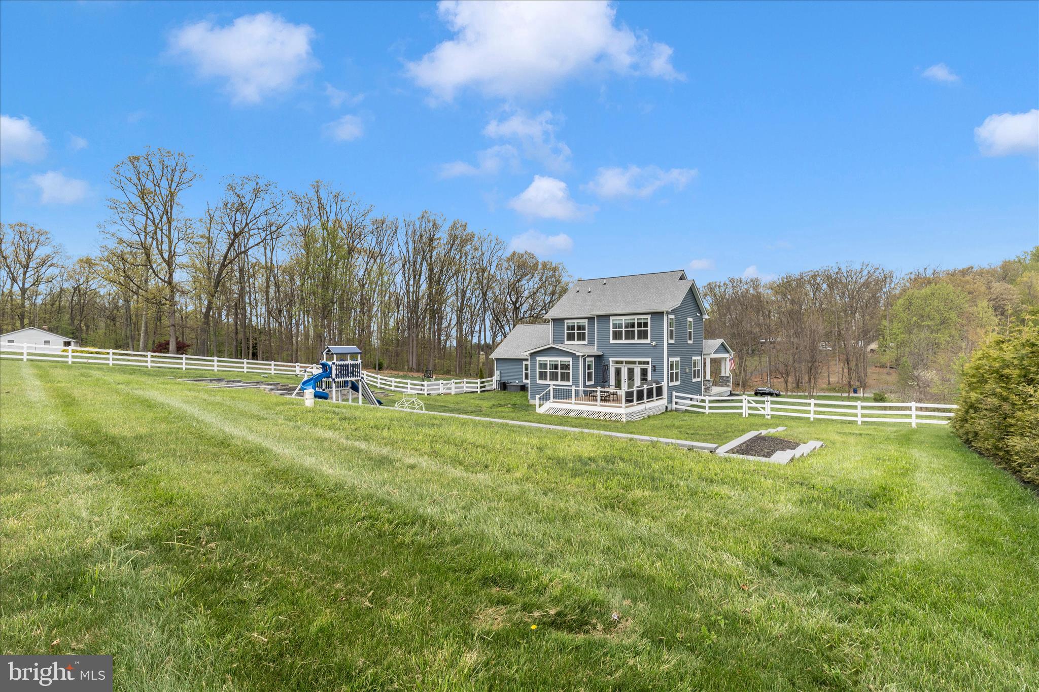 14105 Peddicord Road Mount Airy, MD 21771 - Photo 48 of 52 a view of a playground with basketball court