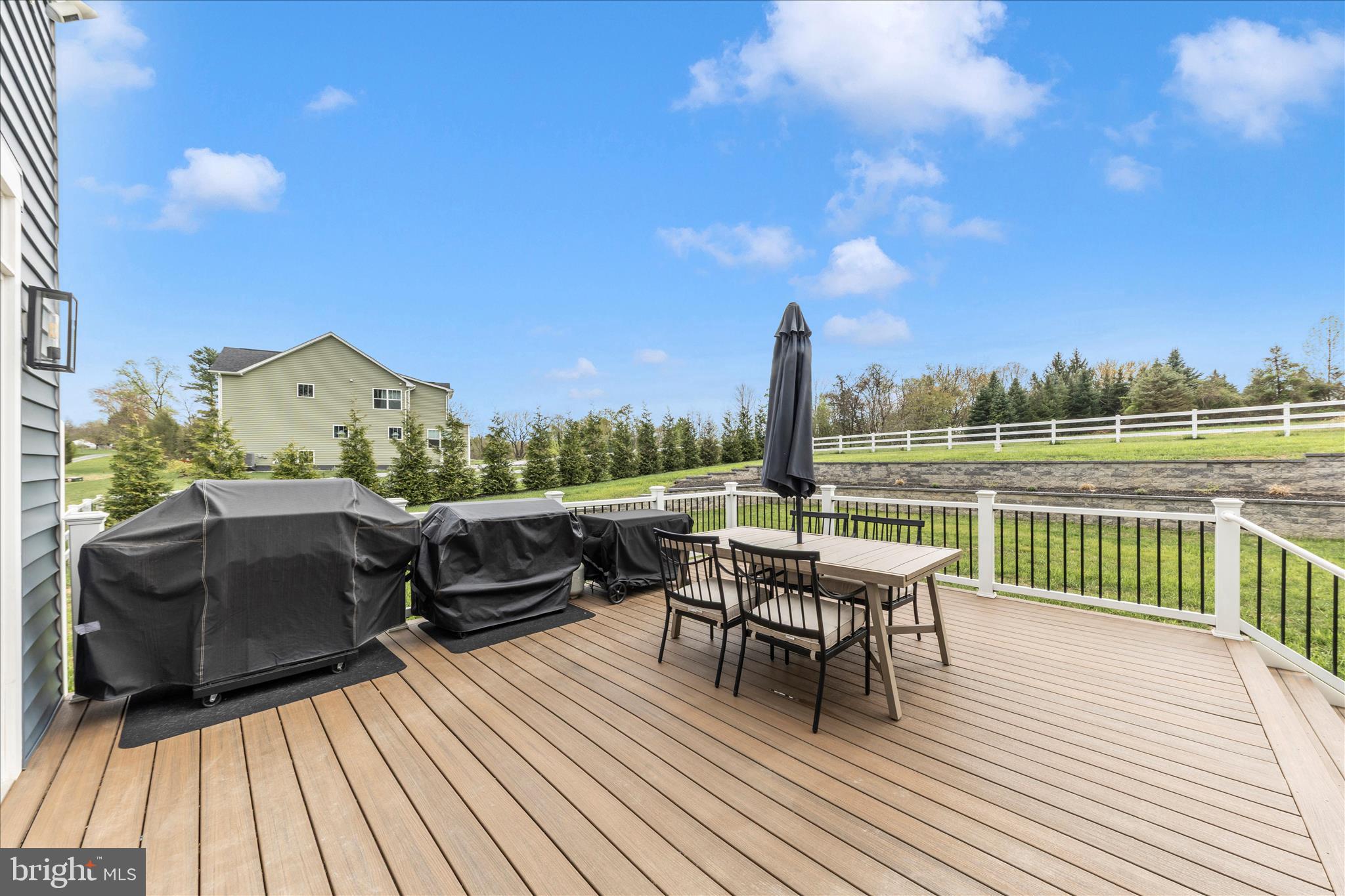 14105 Peddicord Road Mount Airy, MD 21771 - Photo 50 of 52 a roof deck with table and chairs