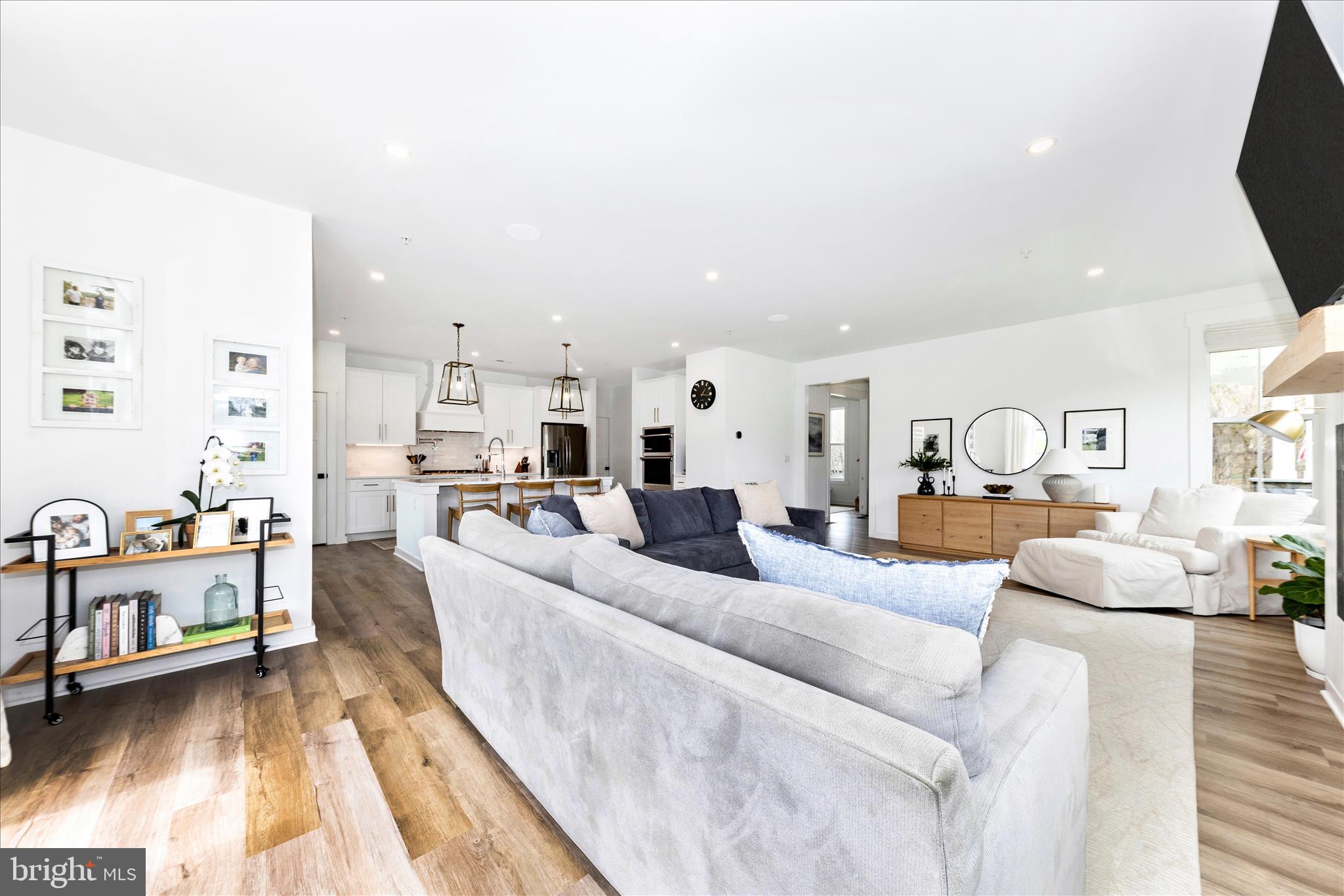 14105 Peddicord Road Mount Airy, MD 21771 - Photo 5 of 52 a living room with furniture and a table