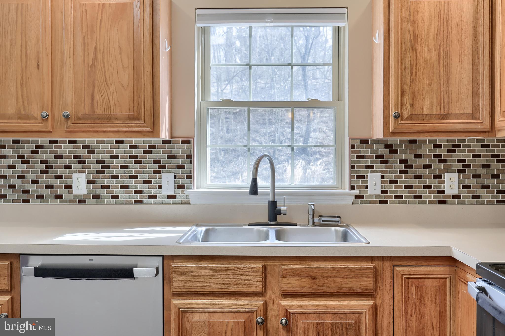 401 Crosswinds Drive Lititz, PA 17543 - Photo 9 of 32 a kitchen with a sink and a window