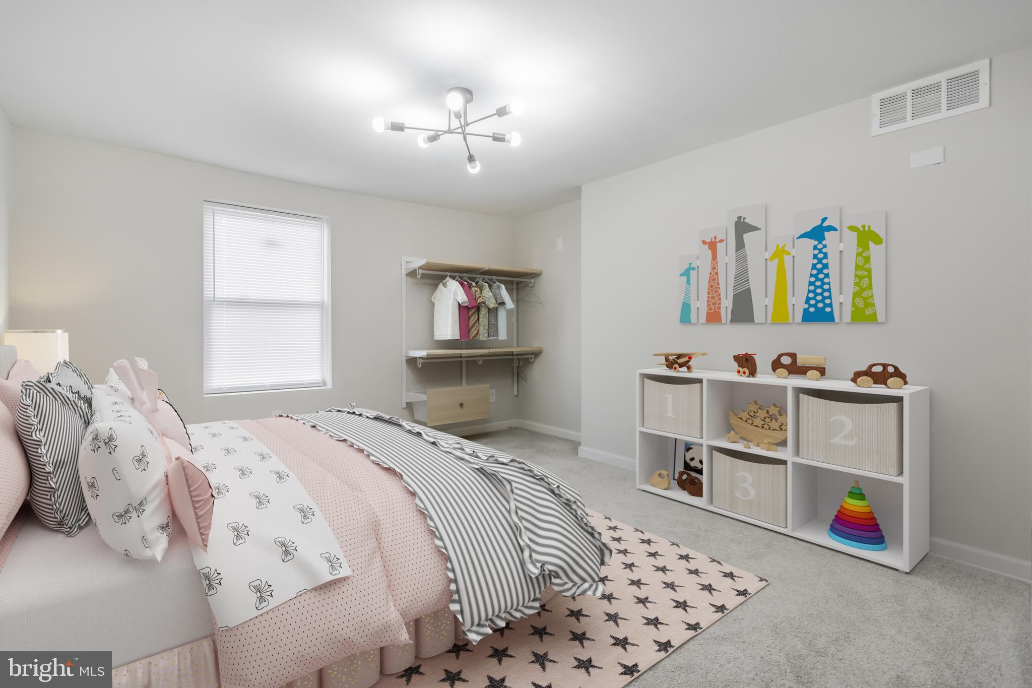 1235 North Bond Street Baltimore, MD 21213 - Photo 11 of 20 a bedroom with a bed and cabinets