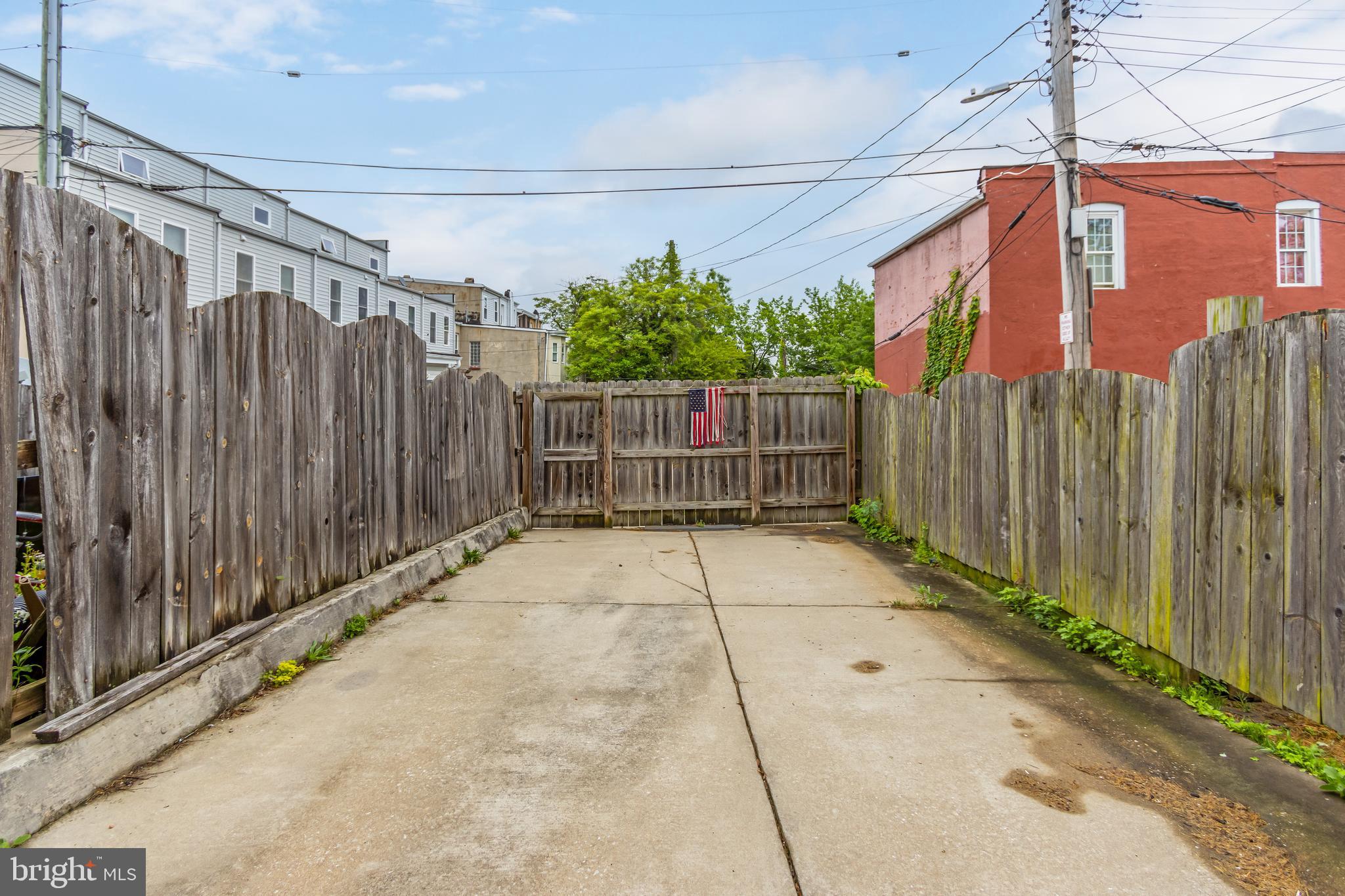 1235 North Bond Street Baltimore, MD 21213 - Photo 17 of 20 a view of a pathway with a small barn