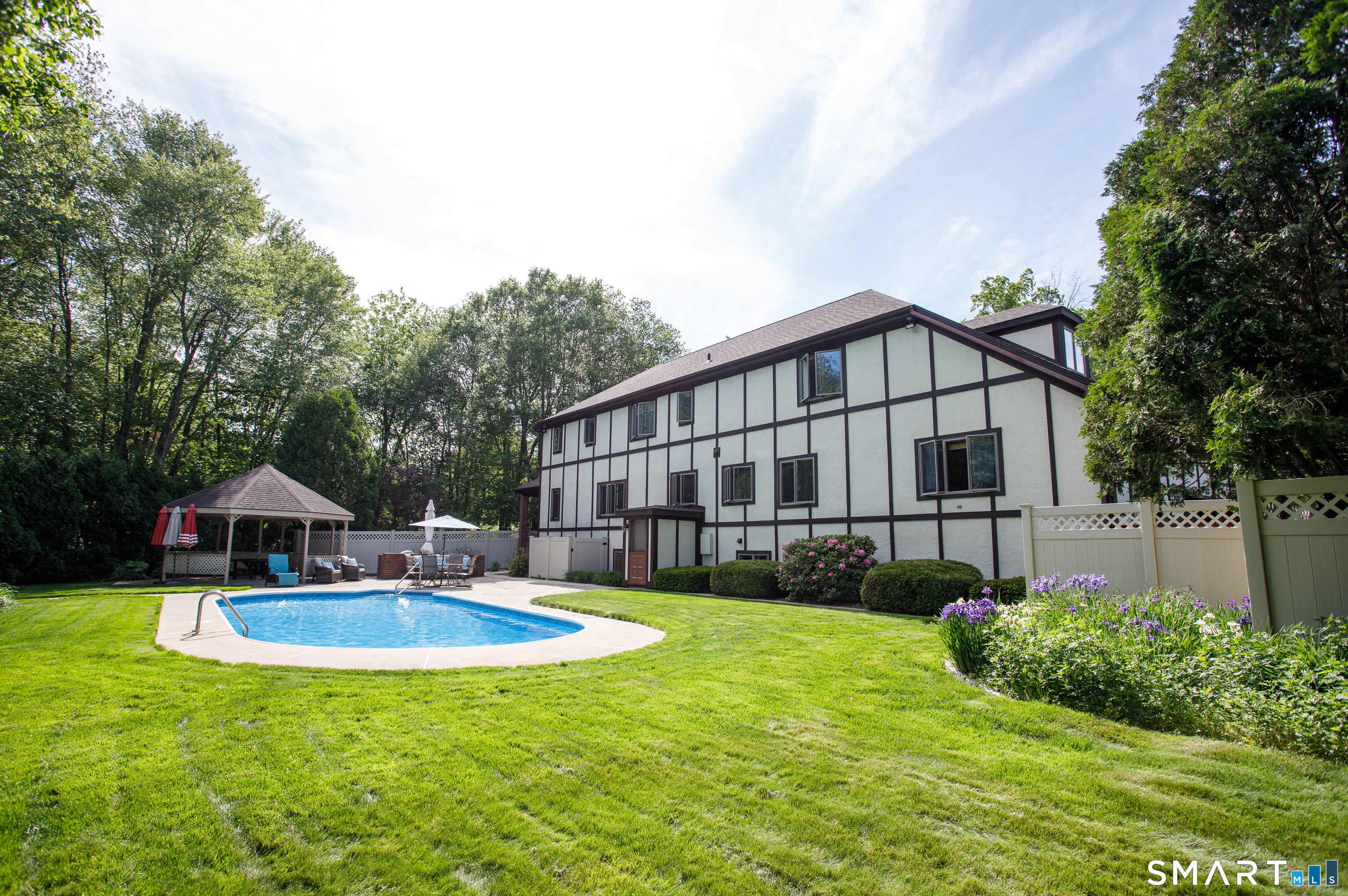 25 Stony Ridge Road Norwich, CT 06360 - Photo 38 of 40 a house with swimming pool in front of it