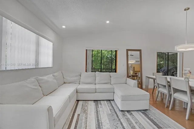 a living room with furniture and a couch