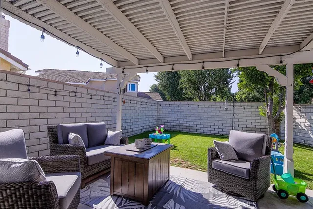 a view of yard with patio