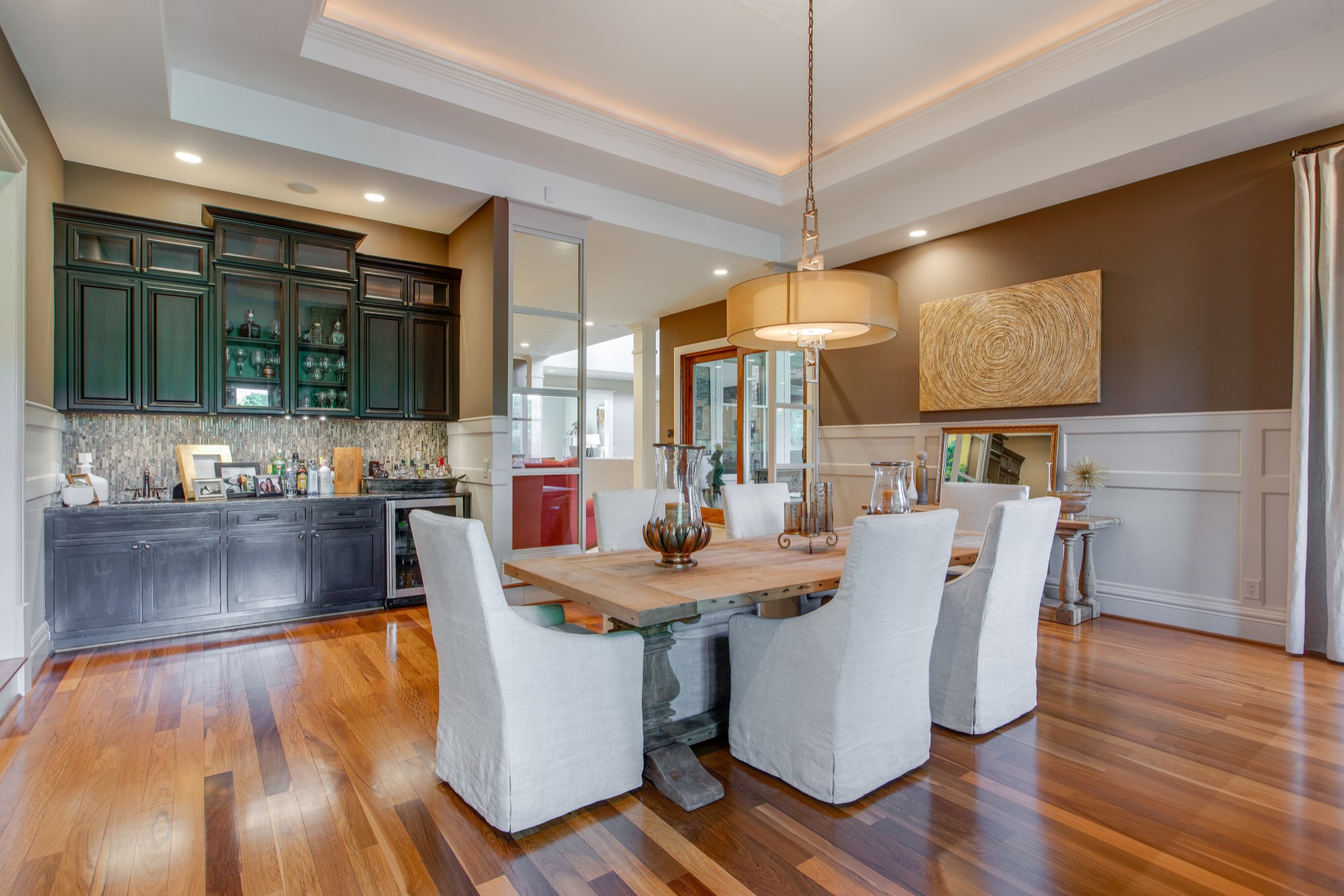 4200 Two Rivers Lane Franklin, TN 37069 - Photo 18 of 44 a dining table with chairs and wooden floor