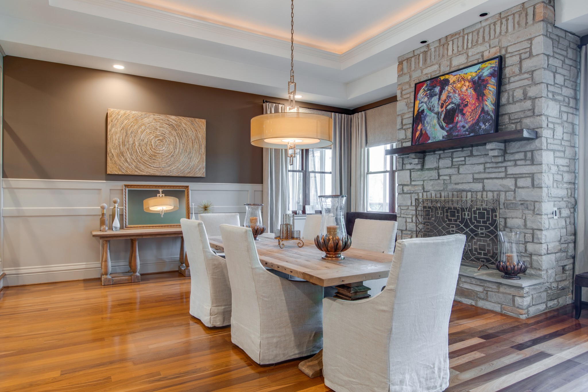 4200 Two Rivers Lane Franklin, TN 37069 - Photo 19 of 44 a dining room with furniture a fireplace and wooden floor