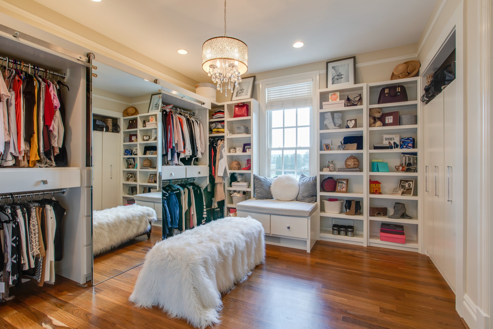 4200 Two Rivers Lane Franklin, TN 37069 - Photo 25 of 44 a living room with furniture and a book shelf