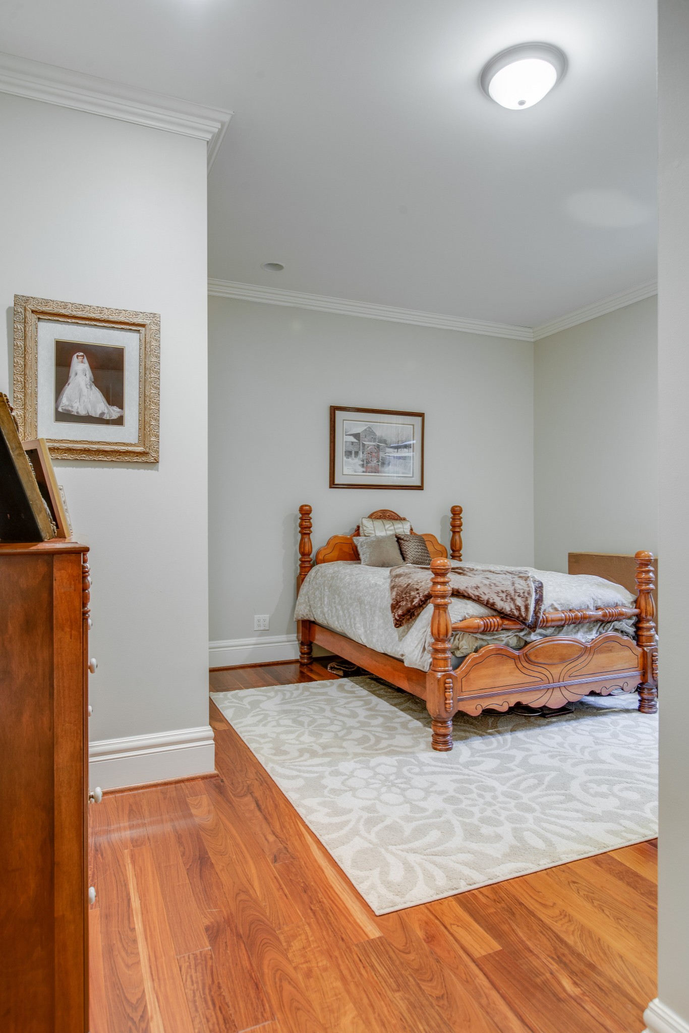 4200 Two Rivers Lane Franklin, TN 37069 - Photo 28 of 44 a bedroom with a bed and painting on the wall