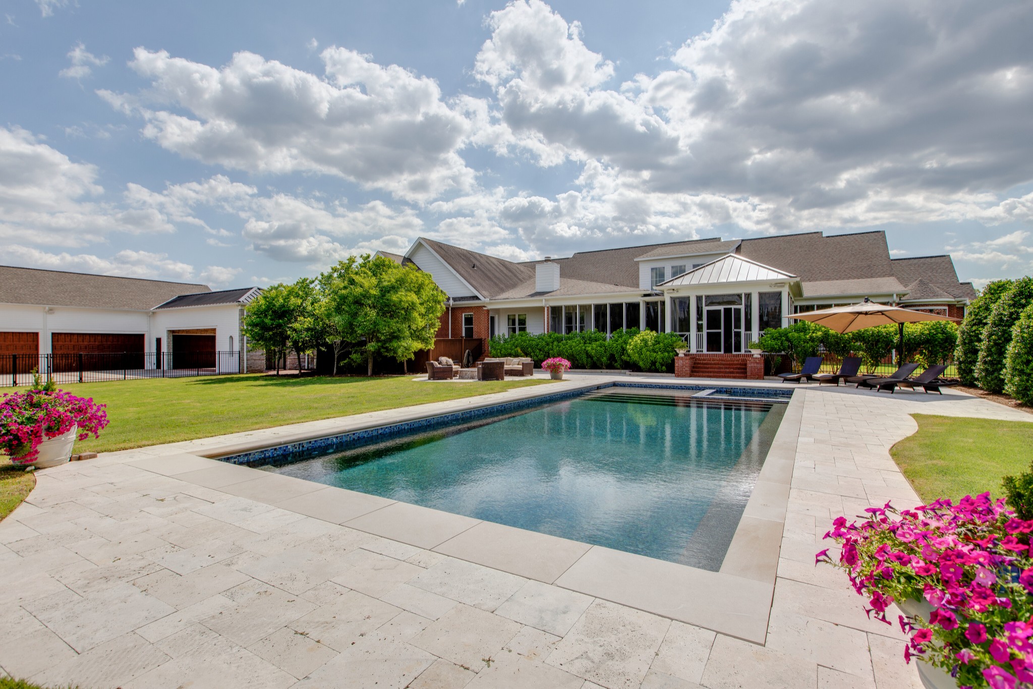 4200 Two Rivers Lane Franklin, TN 37069 - Photo 38 of 44 a view of swimming pool with outdoor seating and a garden