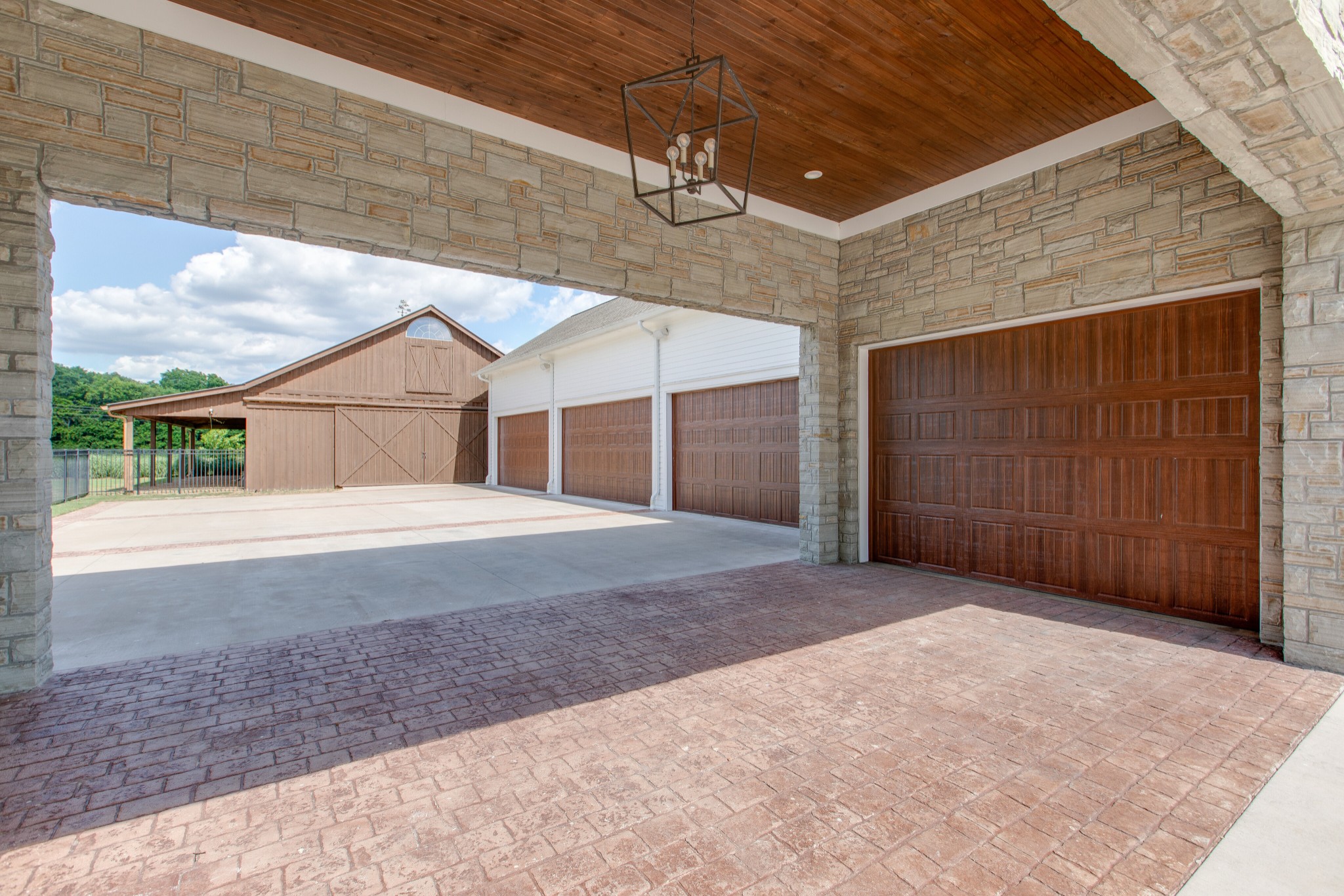 4200 Two Rivers Lane Franklin, TN 37069 - Photo 41 of 44 a front view of a house with a yard and garage