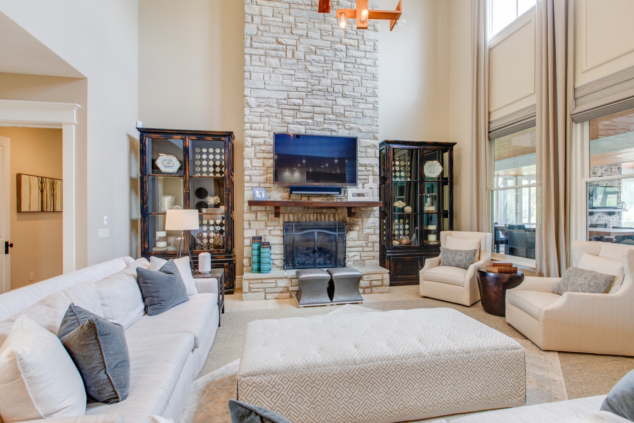4200 Two Rivers Lane Franklin, TN 37069 - Photo 8 of 44 a living room with fireplace furniture and a flat screen tv