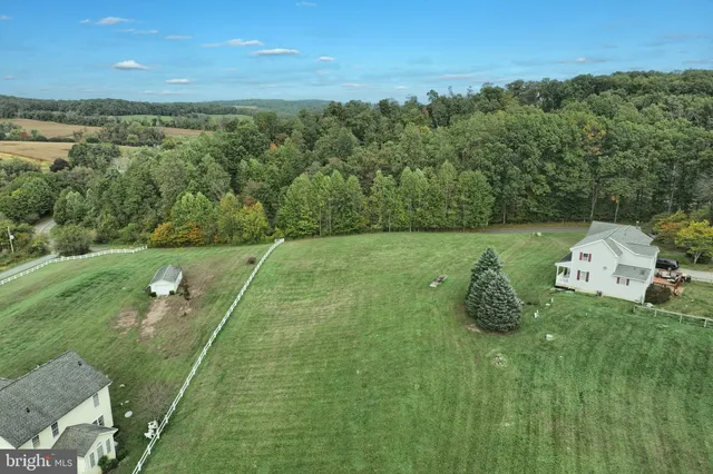 a backyard of a house with lots of green space