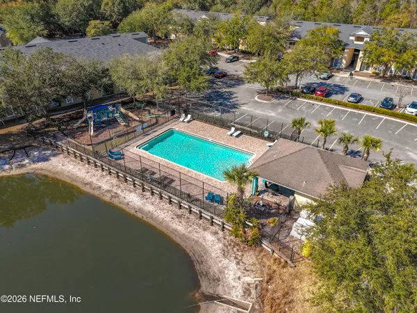 a view of a lake with a house