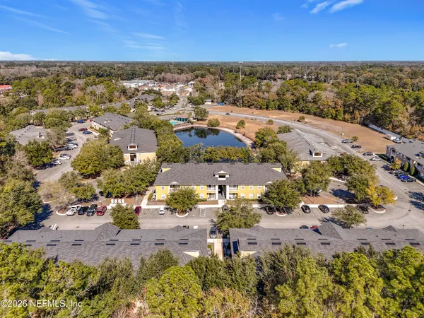 an aerial view of residential building with outdoor space