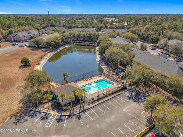 an aerial view of a house having yard