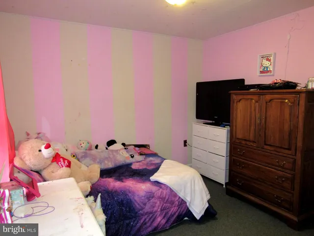 a room with furniture and a window