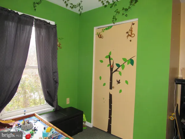 a view of a balcony with wooden floor