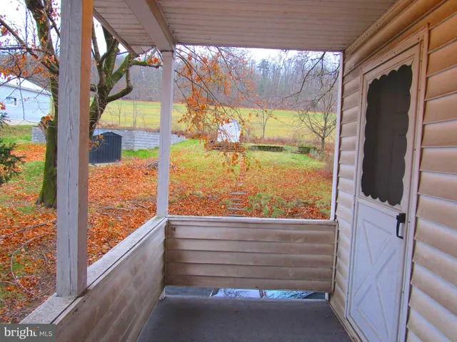 a bedroom with a bed and a closet