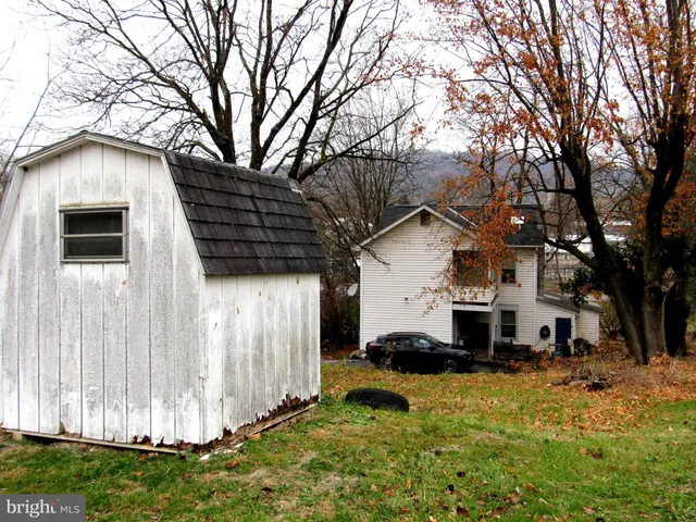 a house view with a outdoor space