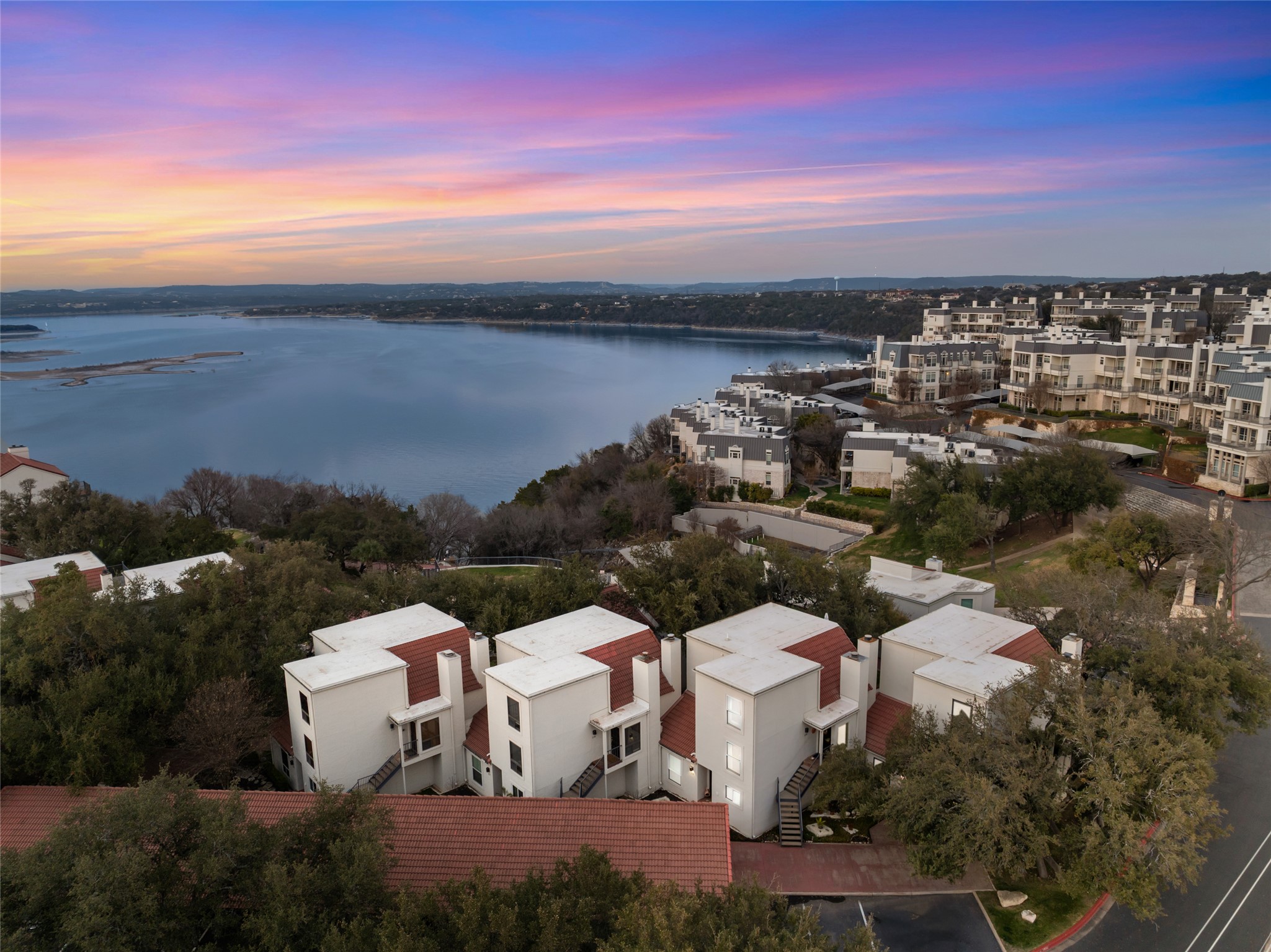 2918 Ranch Road 620 North, Unit C120 Austin, TX 78734 - Photo 1 of 38 a view of a city with sunset