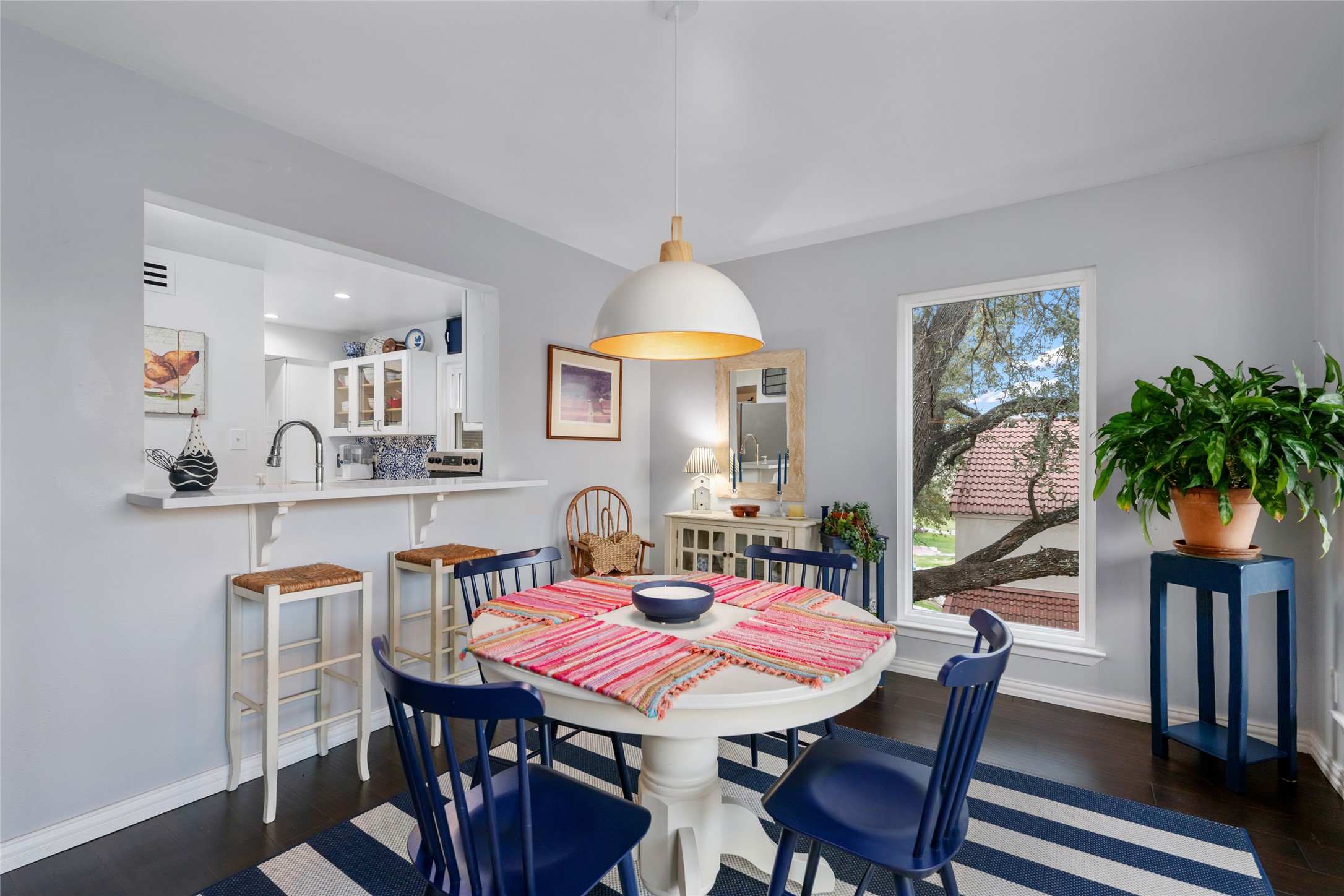 2918 Ranch Road 620 North, Unit C120 Austin, TX 78734 - Photo 13 of 38 a view of a dining room with furniture window and wooden floor