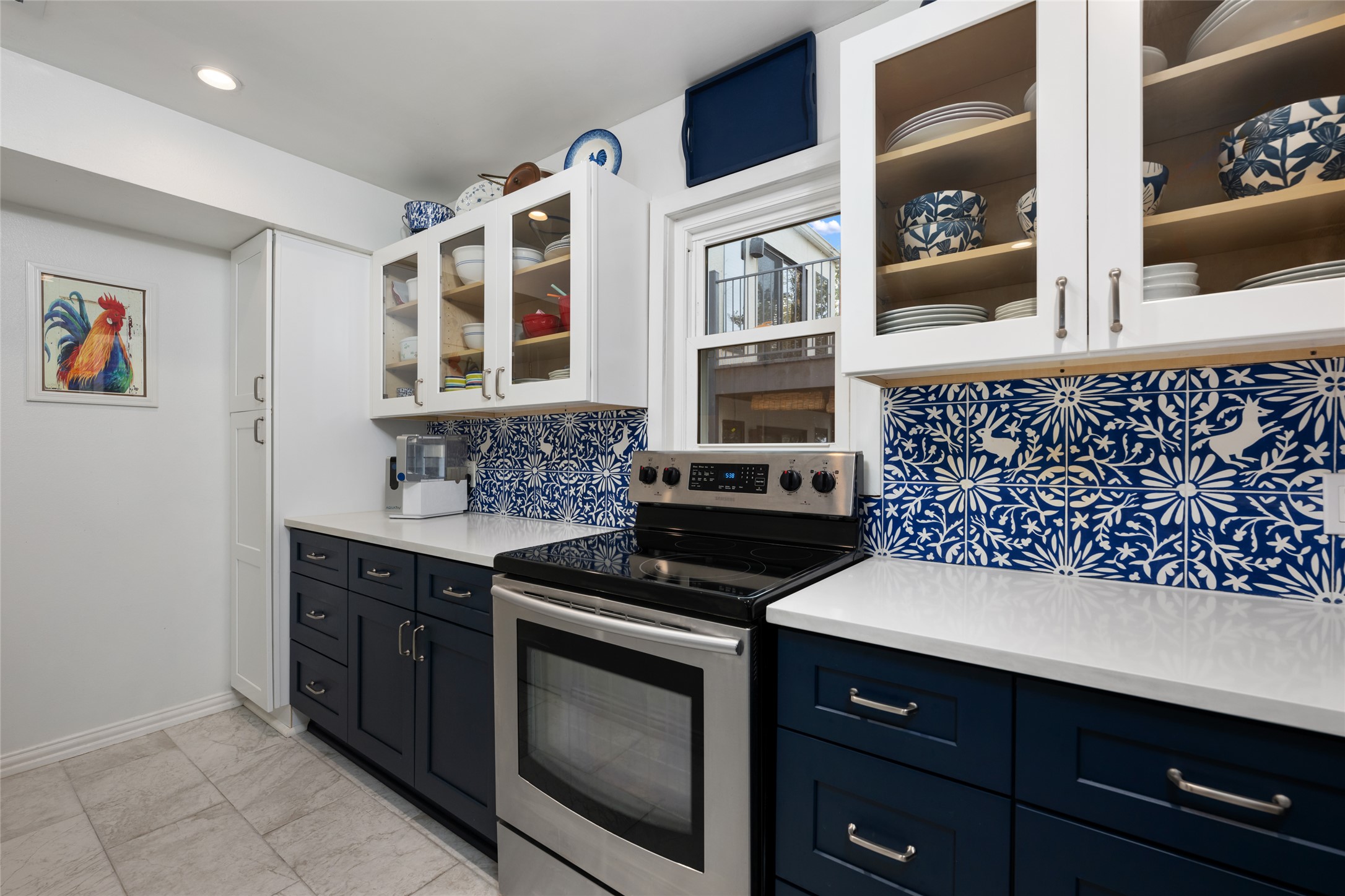 2918 Ranch Road 620 North, Unit C120 Austin, TX 78734 - Photo 16 of 38 a kitchen with stainless steel appliances granite countertop a stove and a microwave