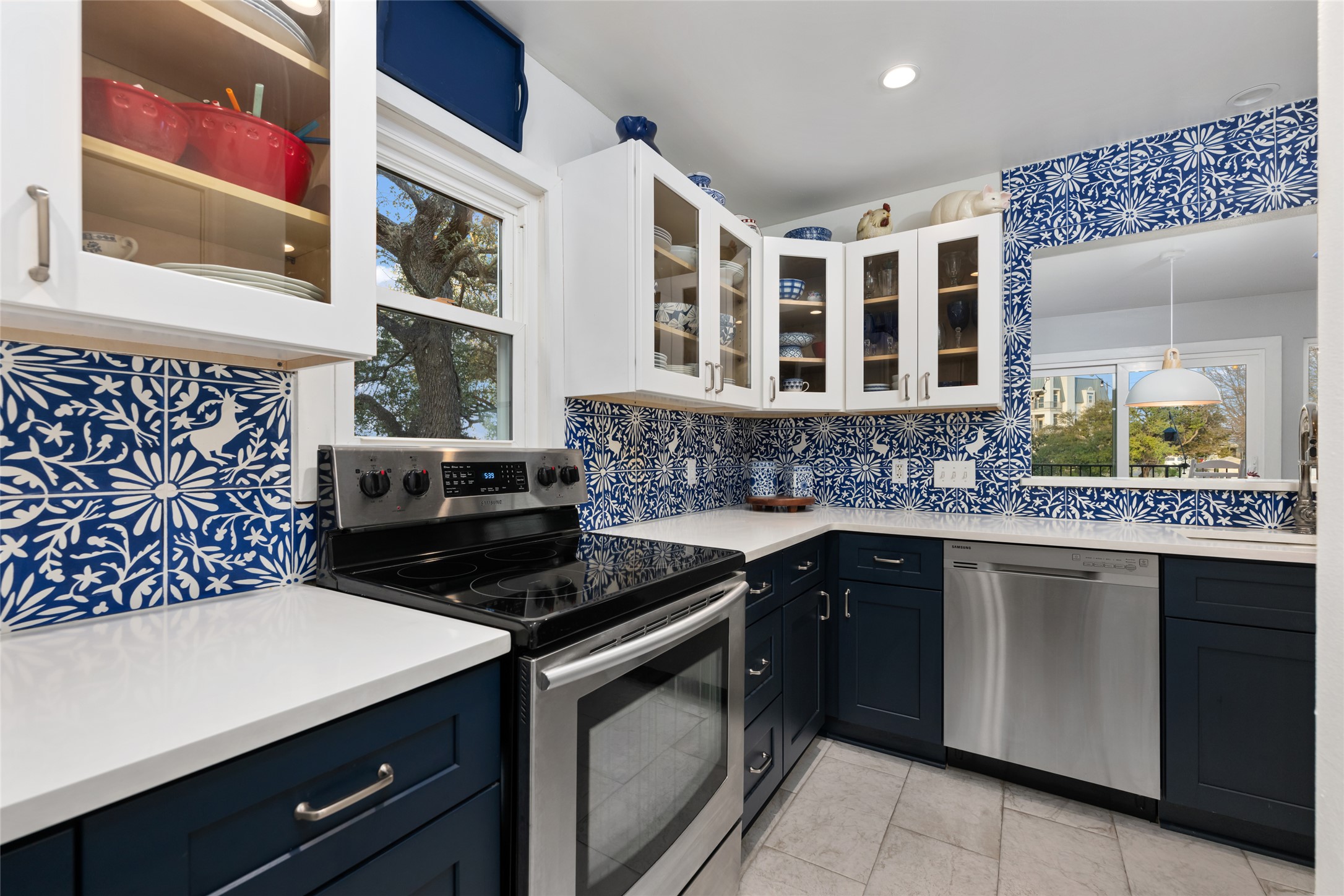 2918 Ranch Road 620 North, Unit C120 Austin, TX 78734 - Photo 17 of 38 a kitchen with stainless steel appliances granite countertop a stove and a sink