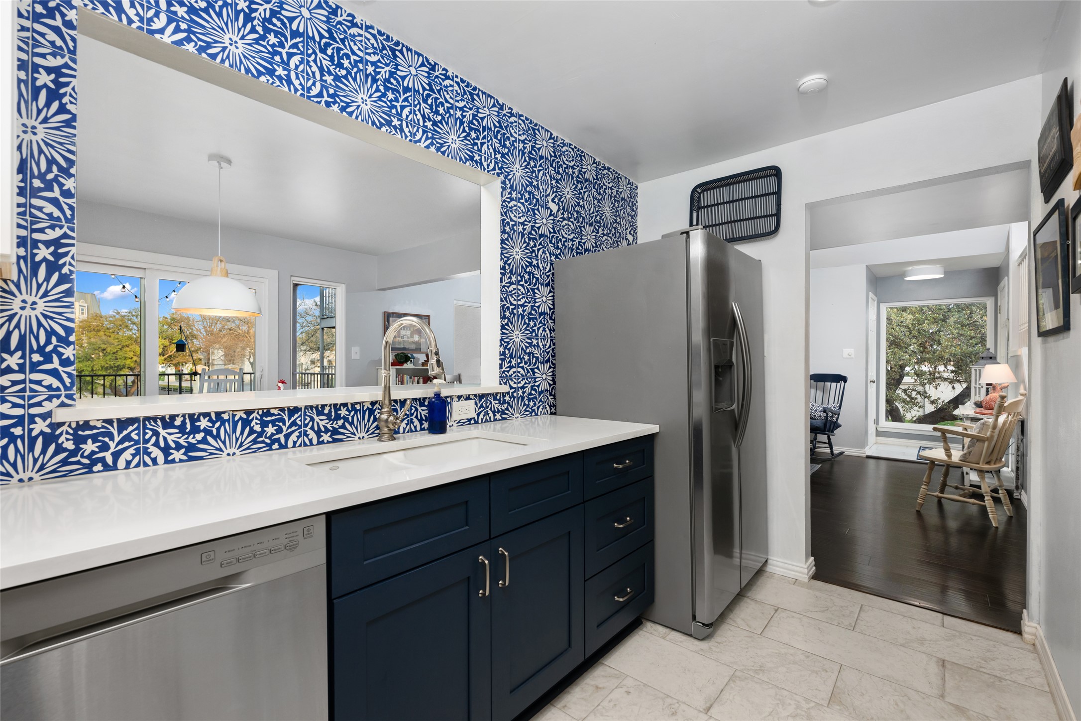 2918 Ranch Road 620 North, Unit C120 Austin, TX 78734 - Photo 18 of 38 a kitchen with a refrigerator and a sink