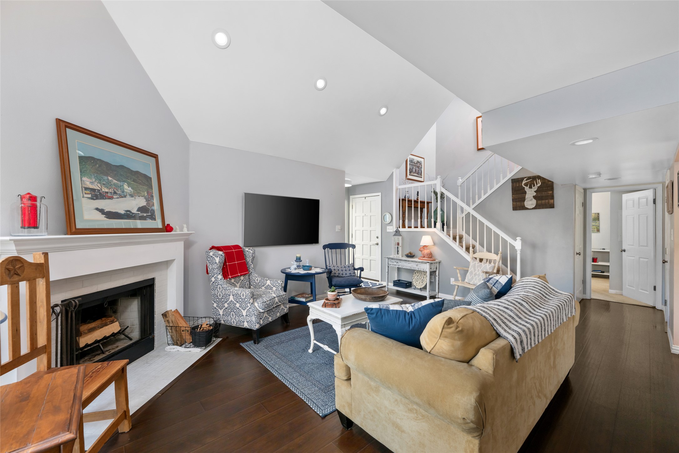 2918 Ranch Road 620 North, Unit C120 Austin, TX 78734 - Photo 19 of 38 a living room with furniture and a fireplace