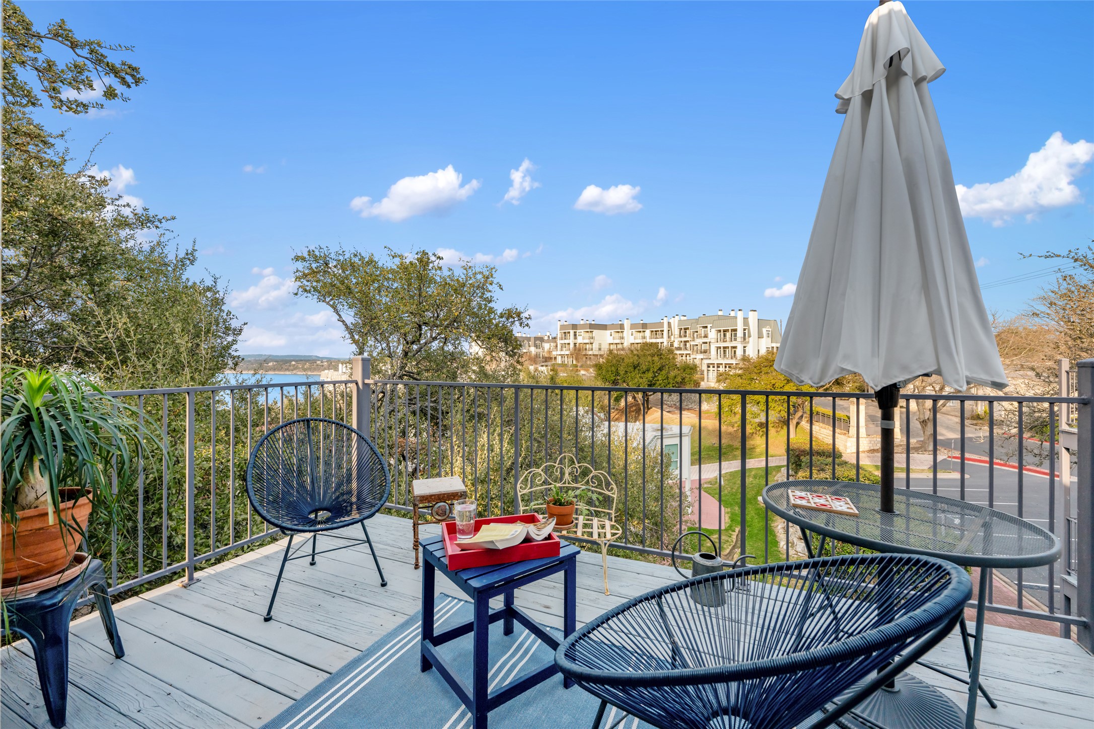 2918 Ranch Road 620 North, Unit C120 Austin, TX 78734 - Photo 2 of 38 a view of a chairs and table in the patio