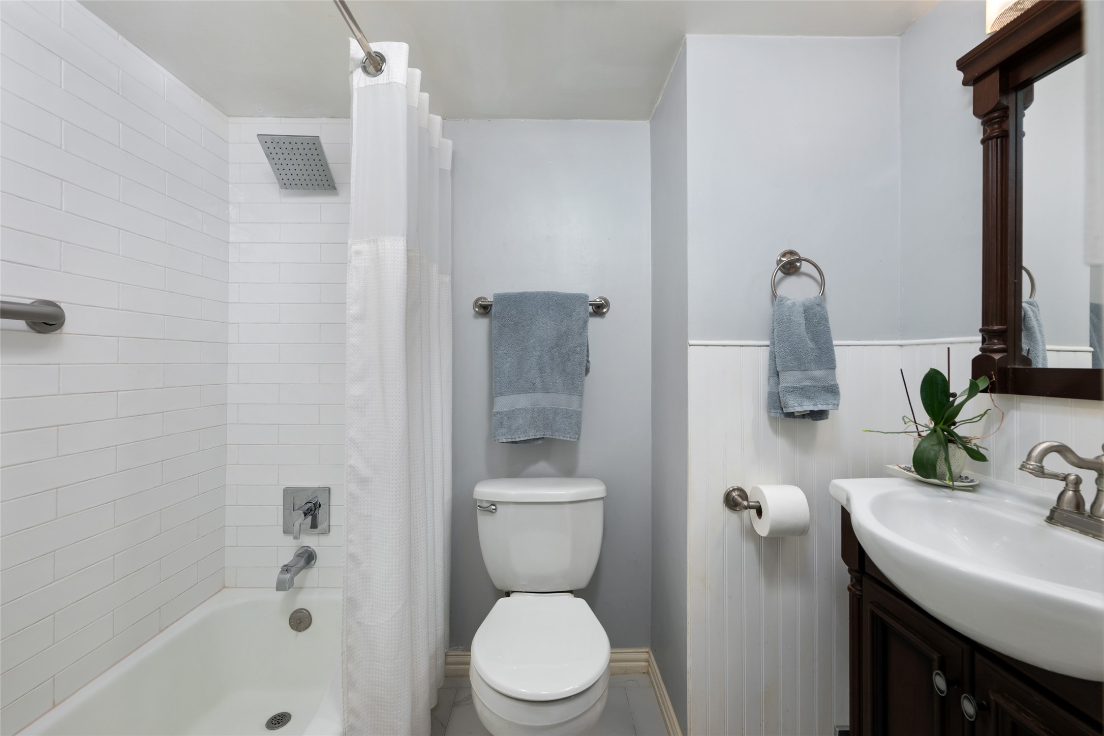 2918 Ranch Road 620 North, Unit C120 Austin, TX 78734 - Photo 21 of 38 a bathroom with a sink a toilet and shower