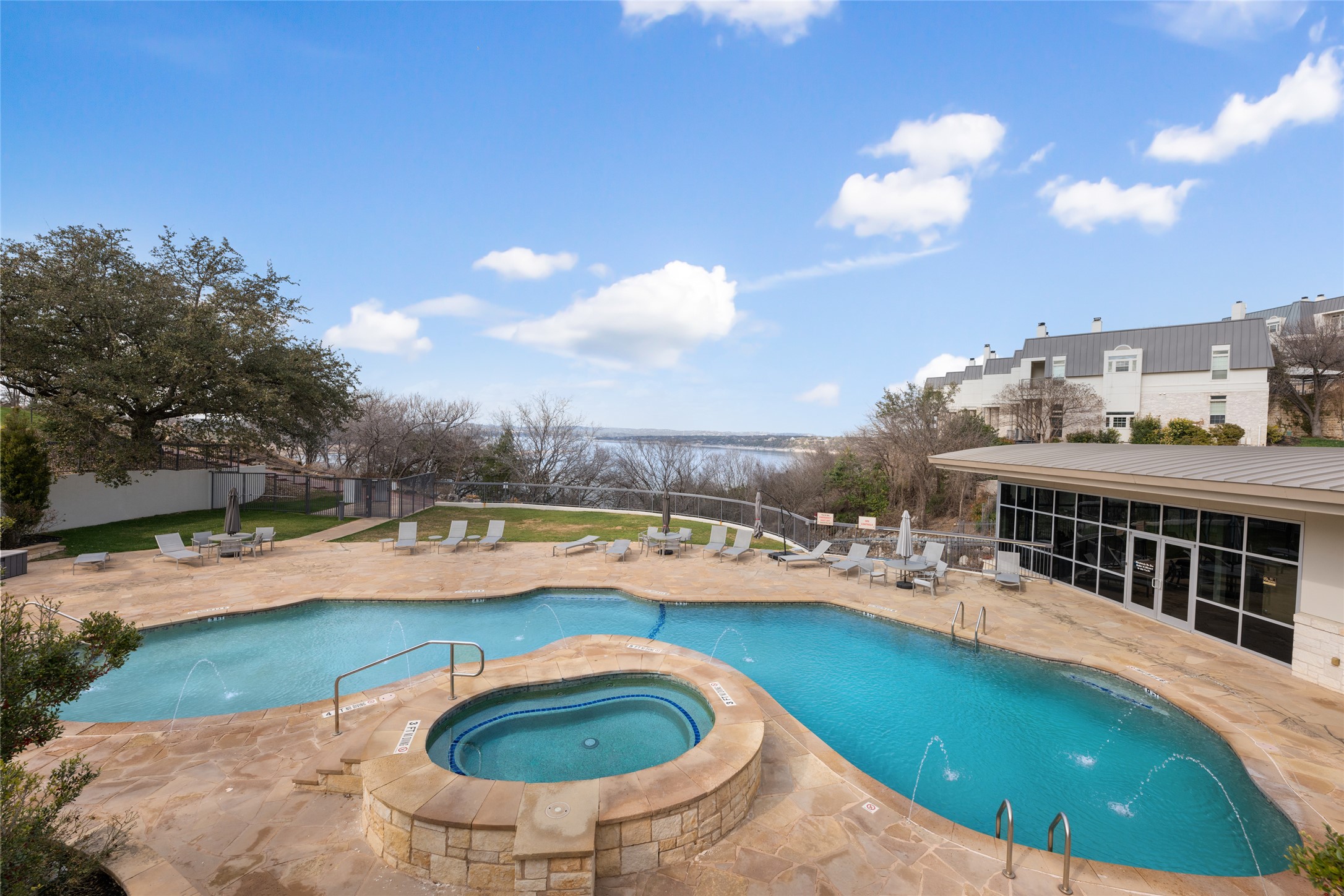 2918 Ranch Road 620 North, Unit C120 Austin, TX 78734 - Photo 31 of 38 a view of a swimming pool with a yard