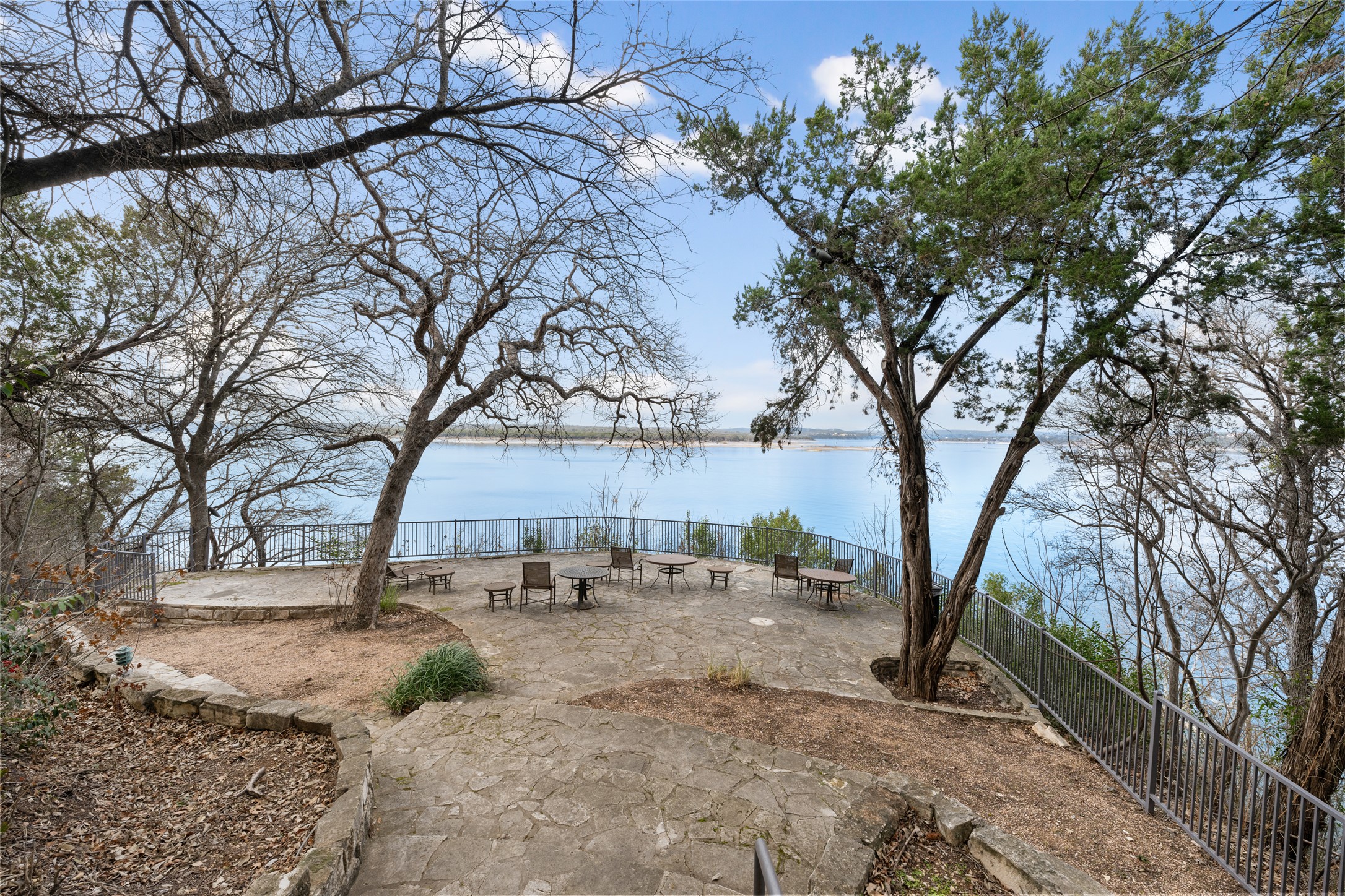 2918 Ranch Road 620 North, Unit C120 Austin, TX 78734 - Photo 32 of 38 a view of backyard with outdoor seating and trees