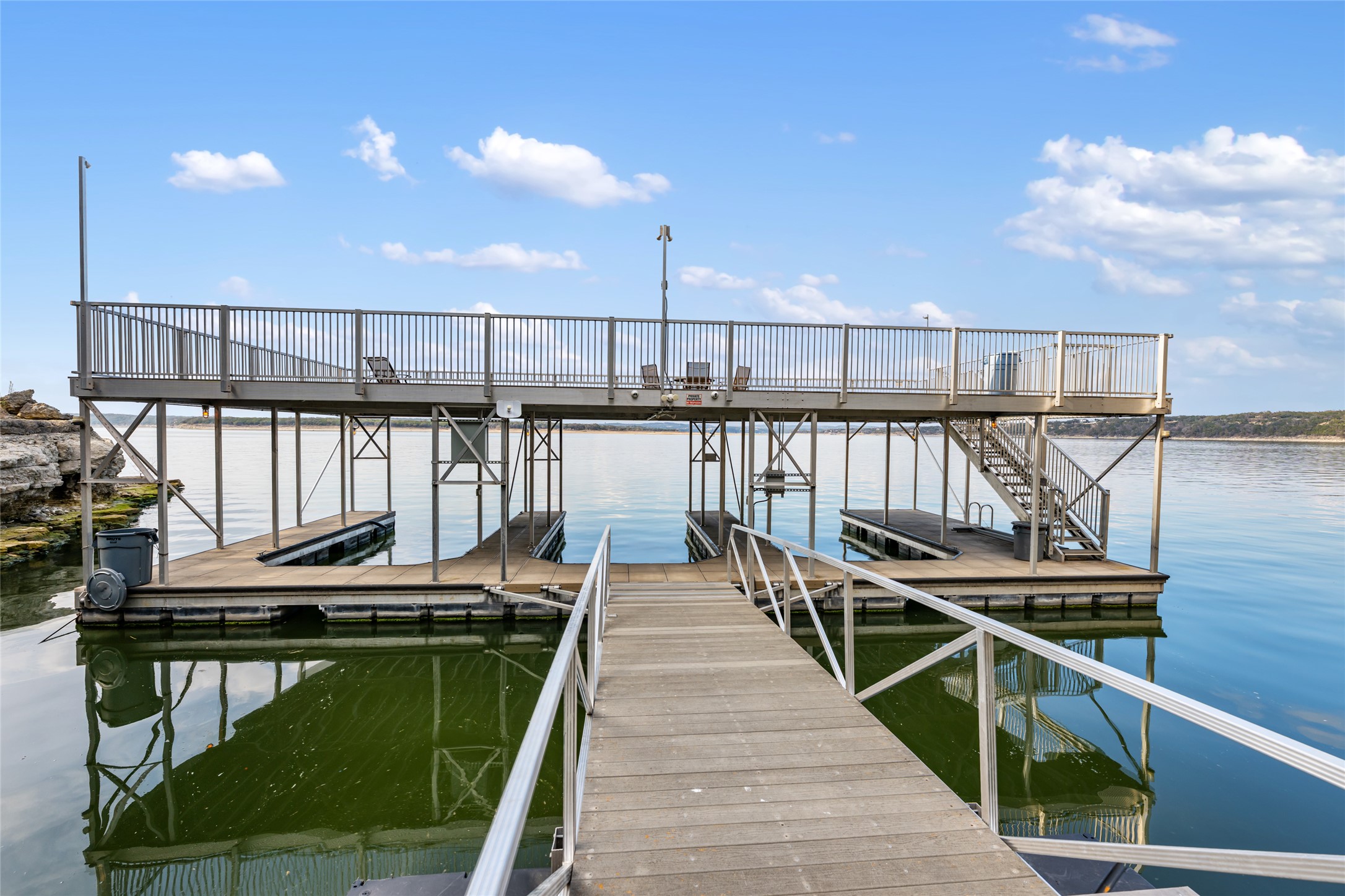 2918 Ranch Road 620 North, Unit C120 Austin, TX 78734 - Photo 33 of 38 a view of a balcony with chairs