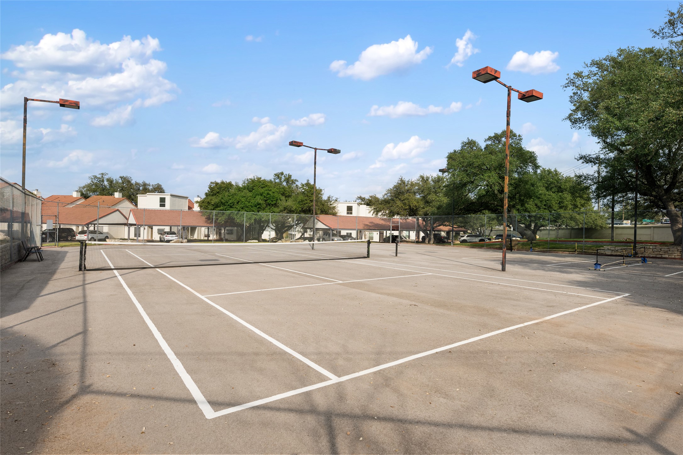 2918 Ranch Road 620 North, Unit C120 Austin, TX 78734 - Photo 35 of 38 a view of a tennis court