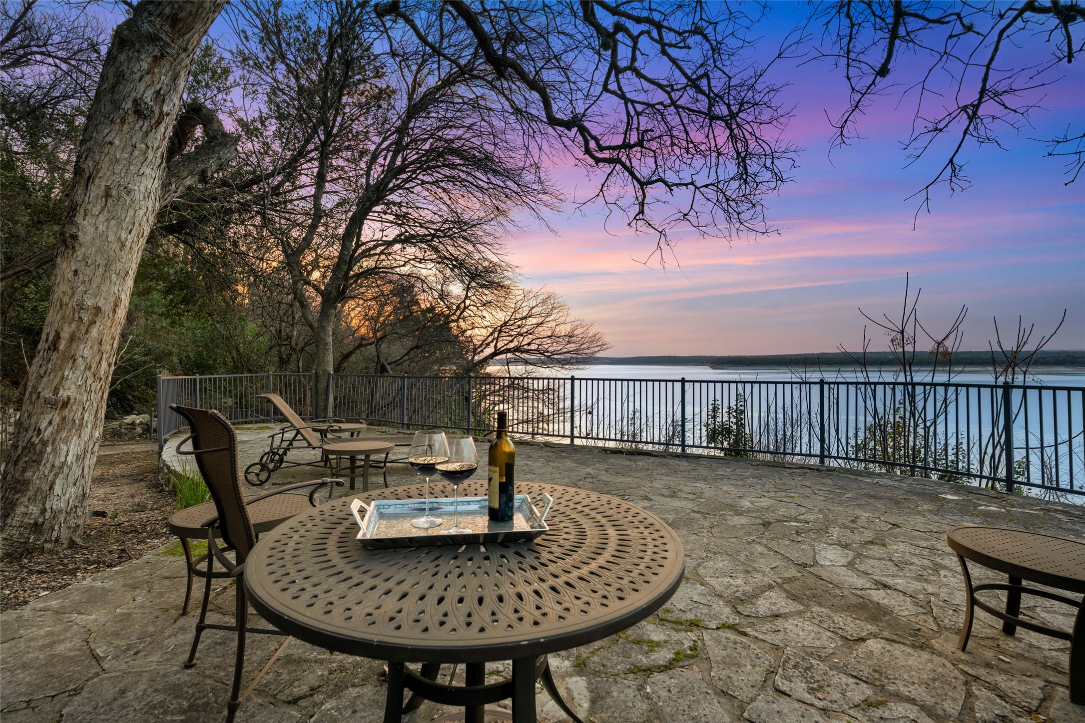 2918 Ranch Road 620 North, Unit C120 Austin, TX 78734 - Photo 4 of 38 a view of a chairs and table in backyard