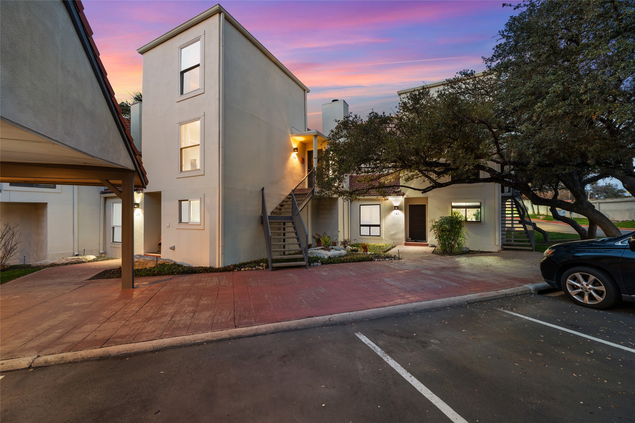 2918 Ranch Road 620 North, Unit C120 Austin, TX 78734 - Photo 5 of 38 a front view of a house with a yard