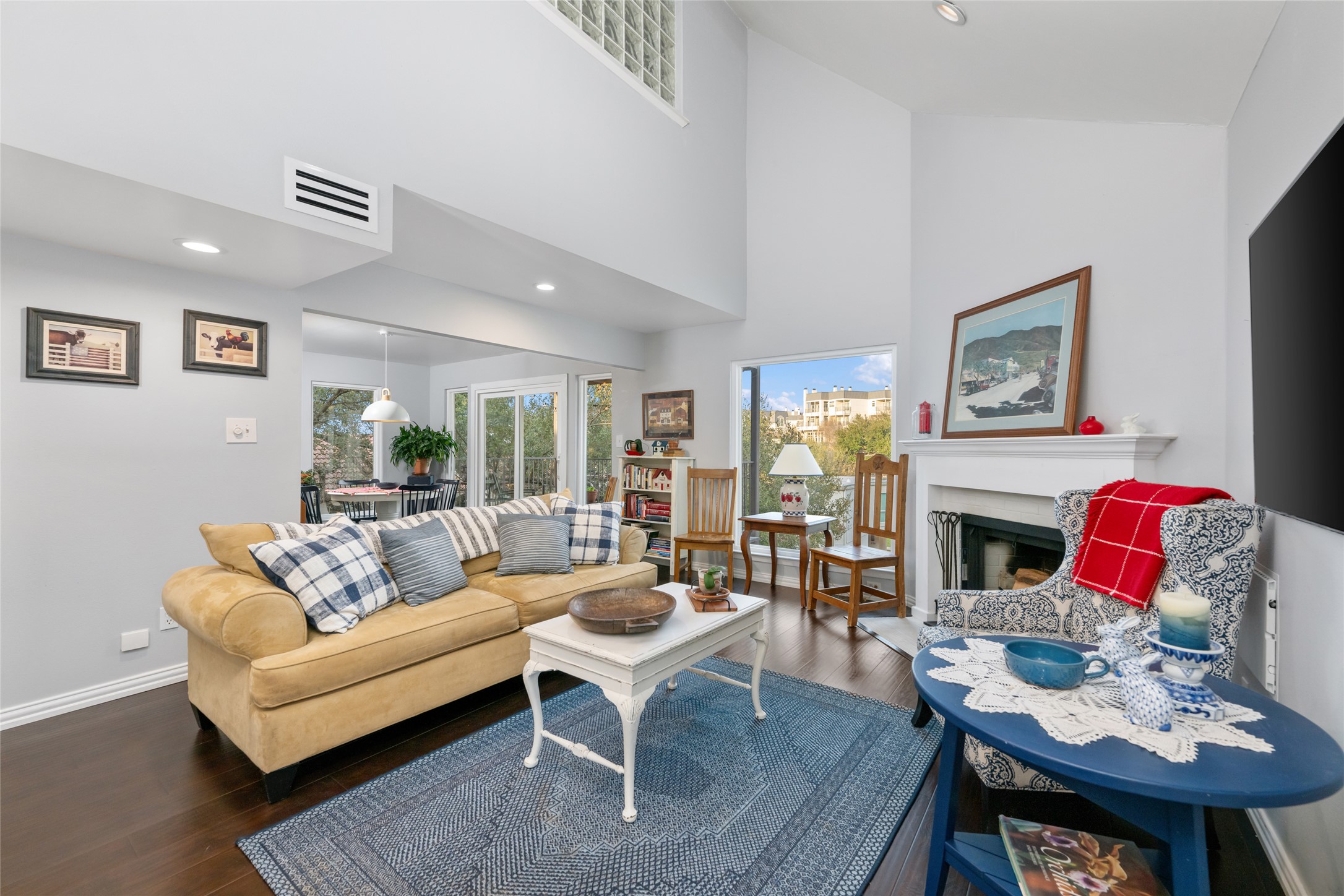 2918 Ranch Road 620 North, Unit C120 Austin, TX 78734 - Photo 8 of 38 a living room with fireplace furniture and a fireplace
