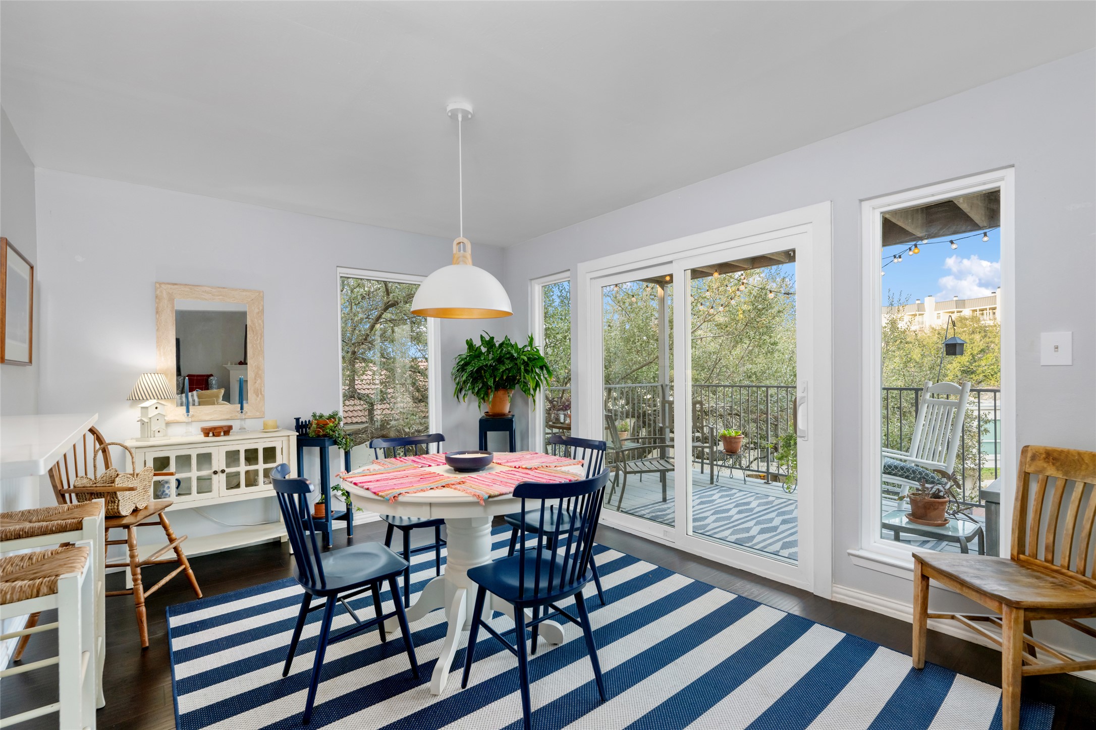 2918 Ranch Road 620 North, Unit C120 Austin, TX 78734 - Photo 10 of 38 a view of a dining room with furniture window and wooden floor