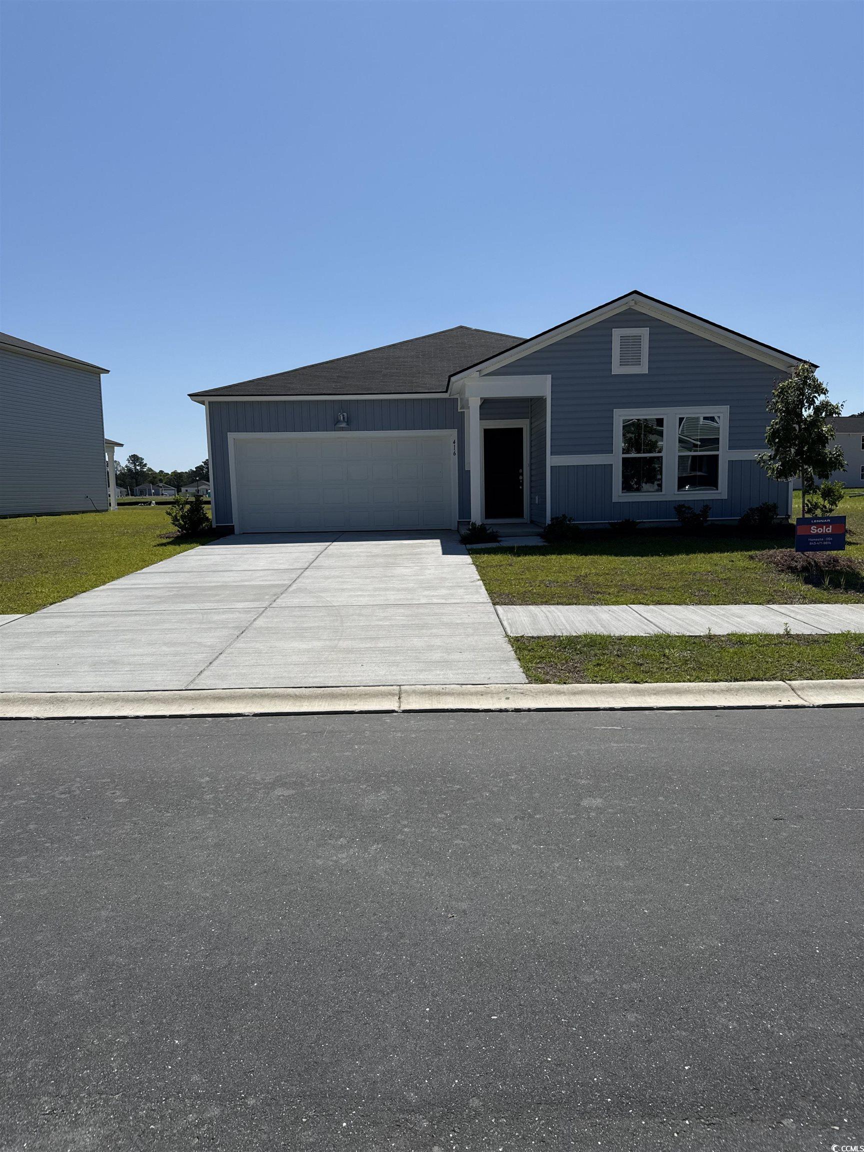 416 Ribbon Rail Way Loris, SC 29569 - Photo 1 of 22 View of front of house with an attached garage, co