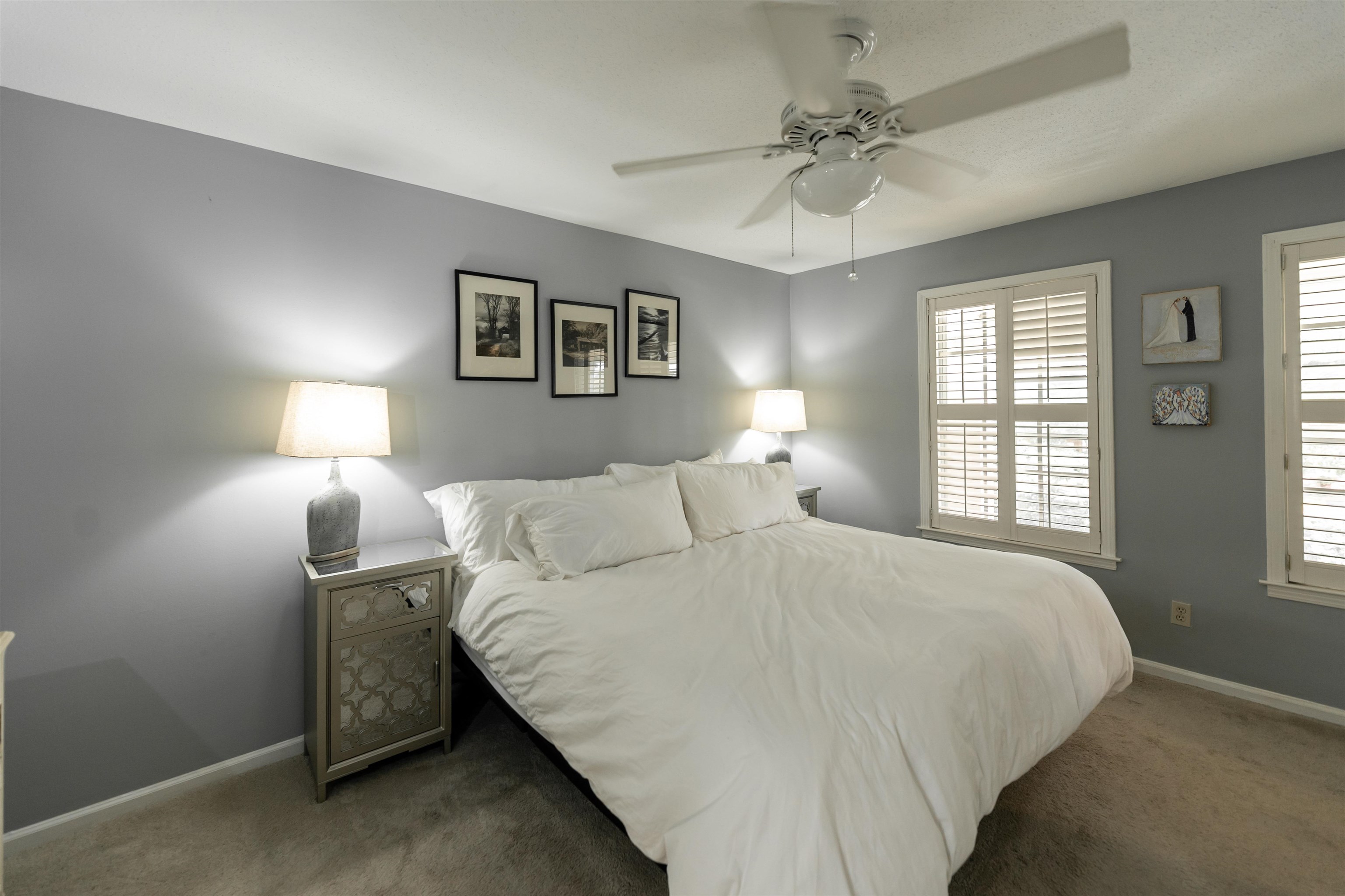 871 South Yates Road, Unit 1 Memphis, TN 38120 - Photo 11 of 23 a bedroom with a bed and a chandelier