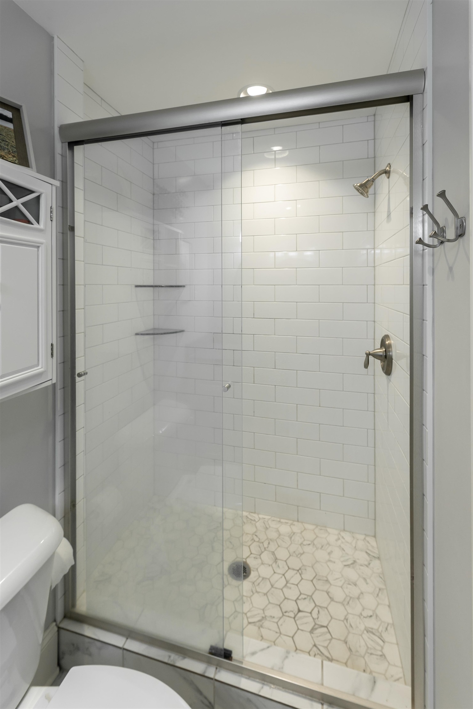 871 South Yates Road, Unit 1 Memphis, TN 38120 - Photo 15 of 23 a bathroom with a shower and a toilet