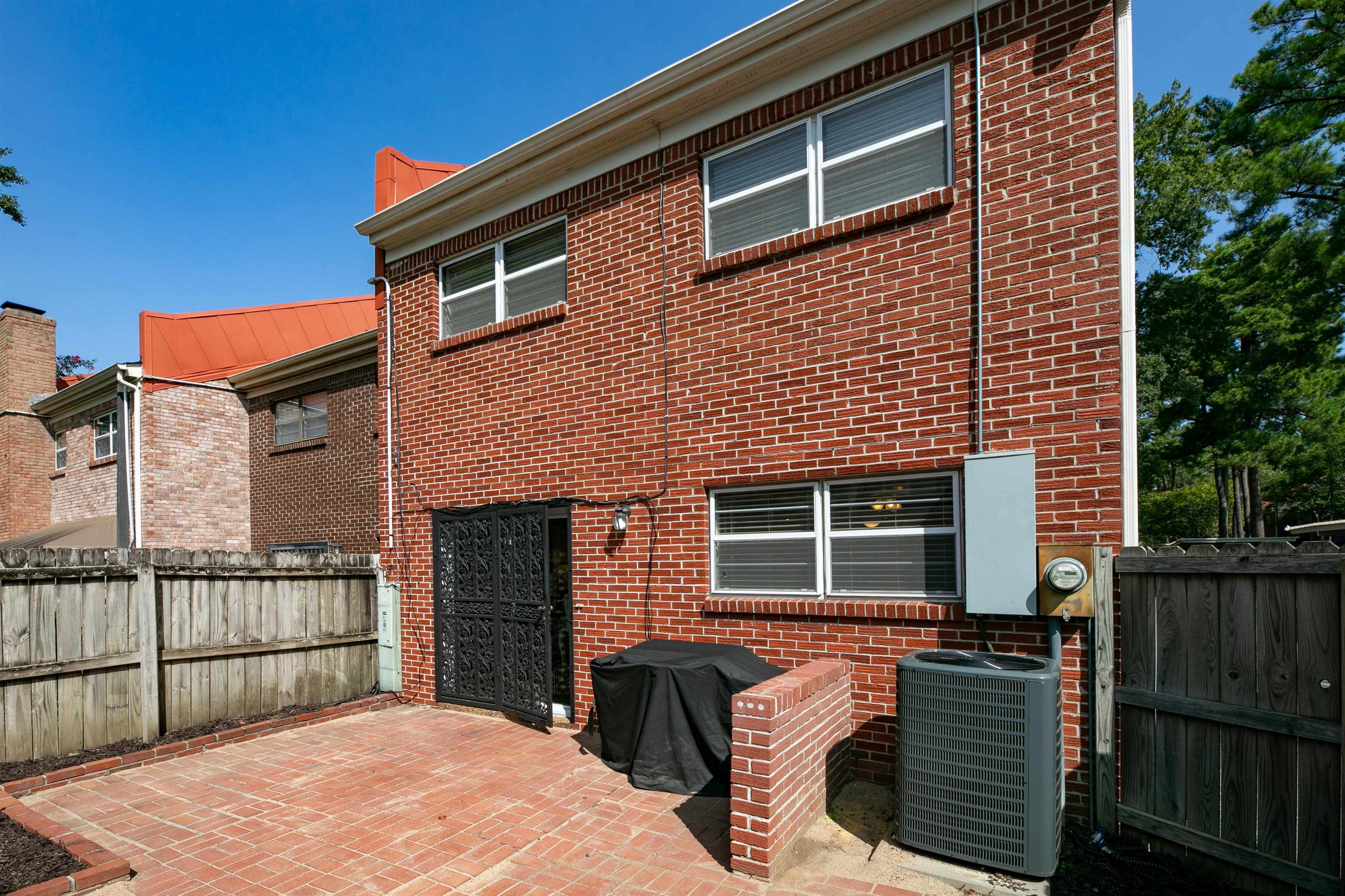 871 South Yates Road, Unit 1 Memphis, TN 38120 - Photo 22 of 23 a front view of a house with glass windows
