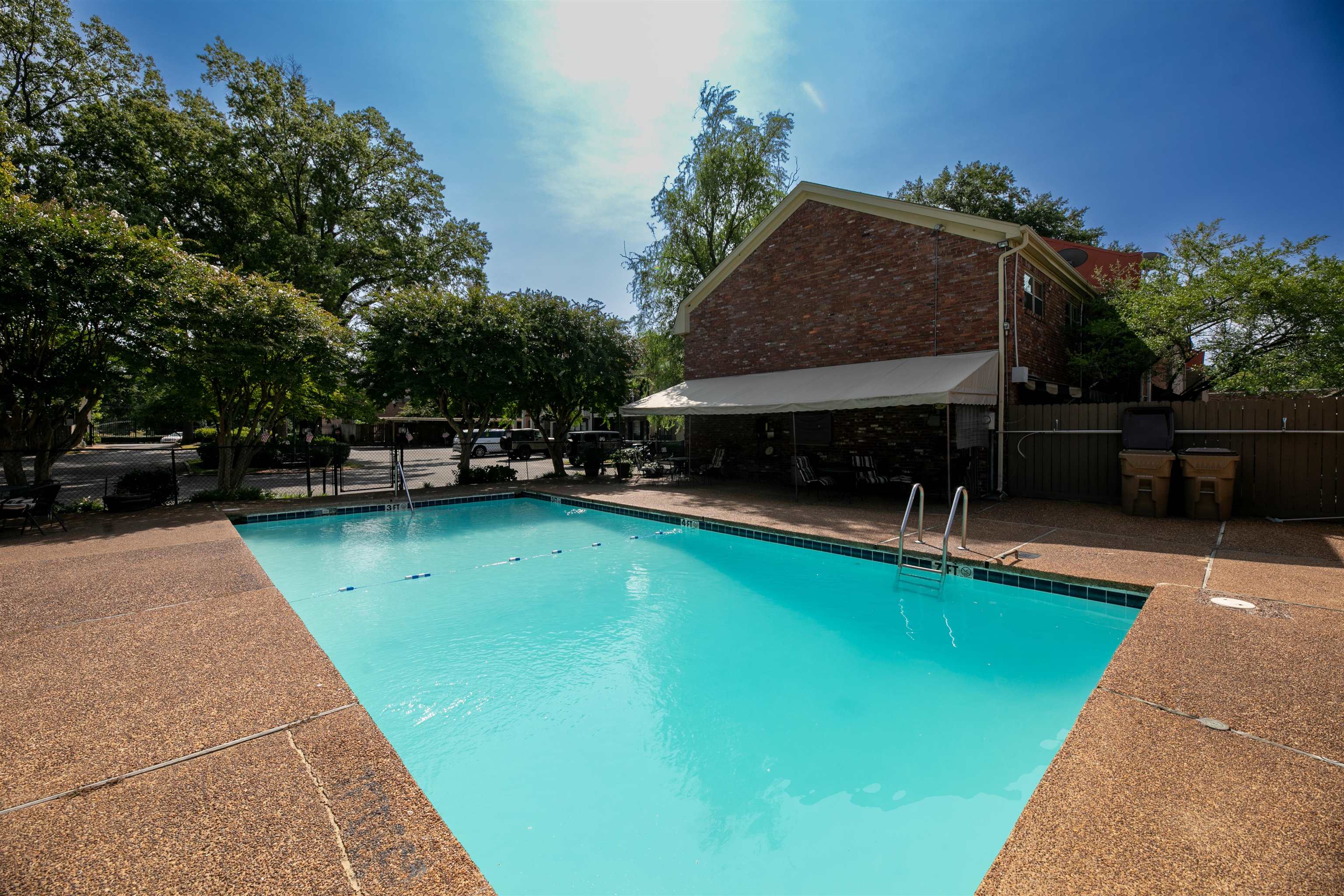 871 South Yates Road, Unit 1 Memphis, TN 38120 - Photo 23 of 23 a view of a swimming pool with a patio