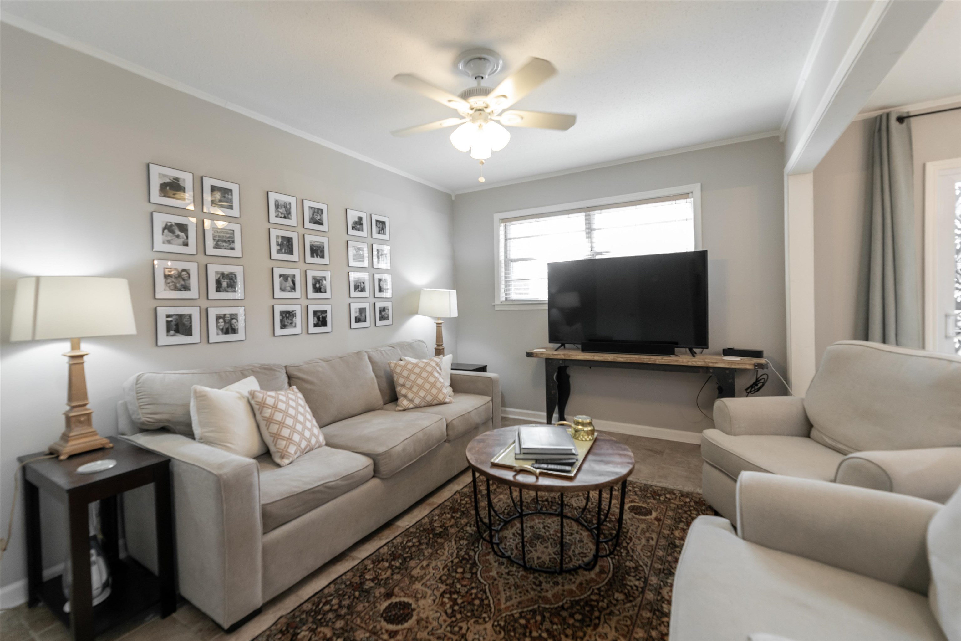 871 South Yates Road, Unit 1 Memphis, TN 38120 - Photo 9 of 23 a living room with furniture and a flat screen tv