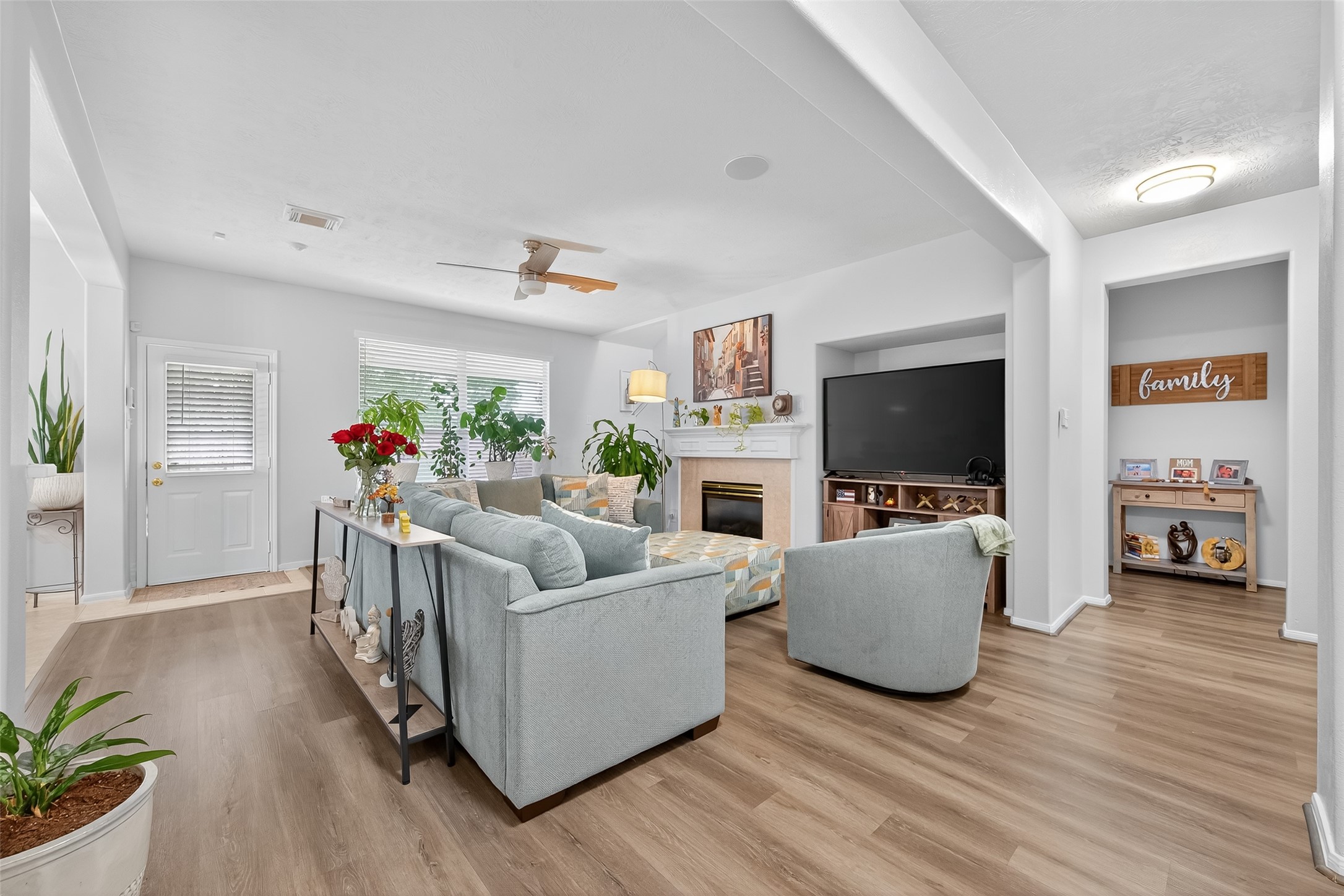 19343 Dickson Park Drive Spring, TX 77373 - Photo 11 of 49 a living room with furniture and a flat screen tv