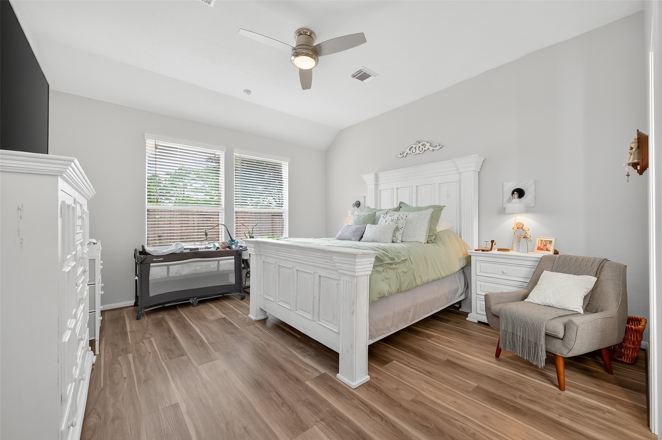 19343 Dickson Park Drive Spring, TX 77373 - Photo 13 of 49 a bedroom with a bed and a couch