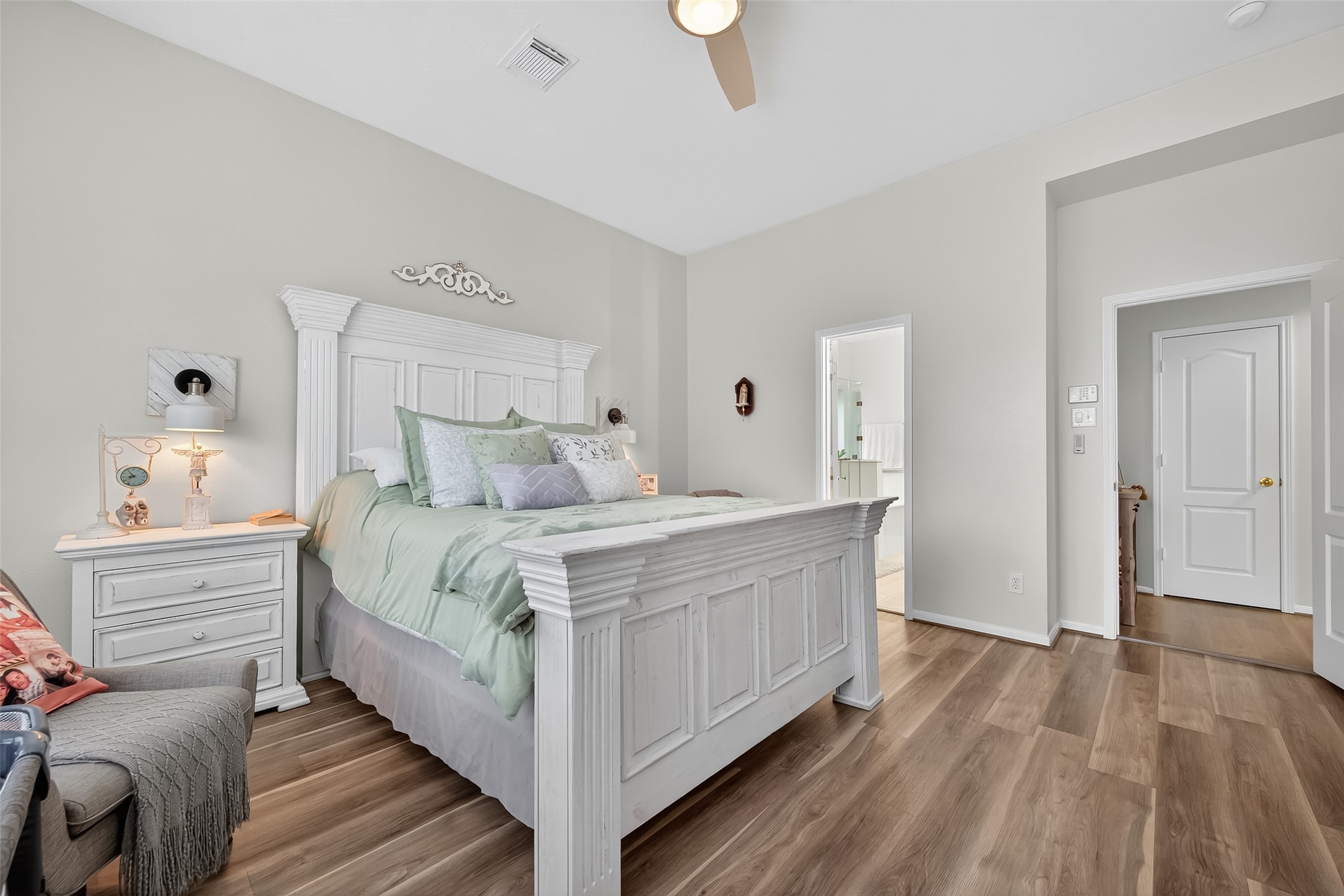 19343 Dickson Park Drive Spring, TX 77373 - Photo 15 of 49 a bedroom with a bed and wooden floor