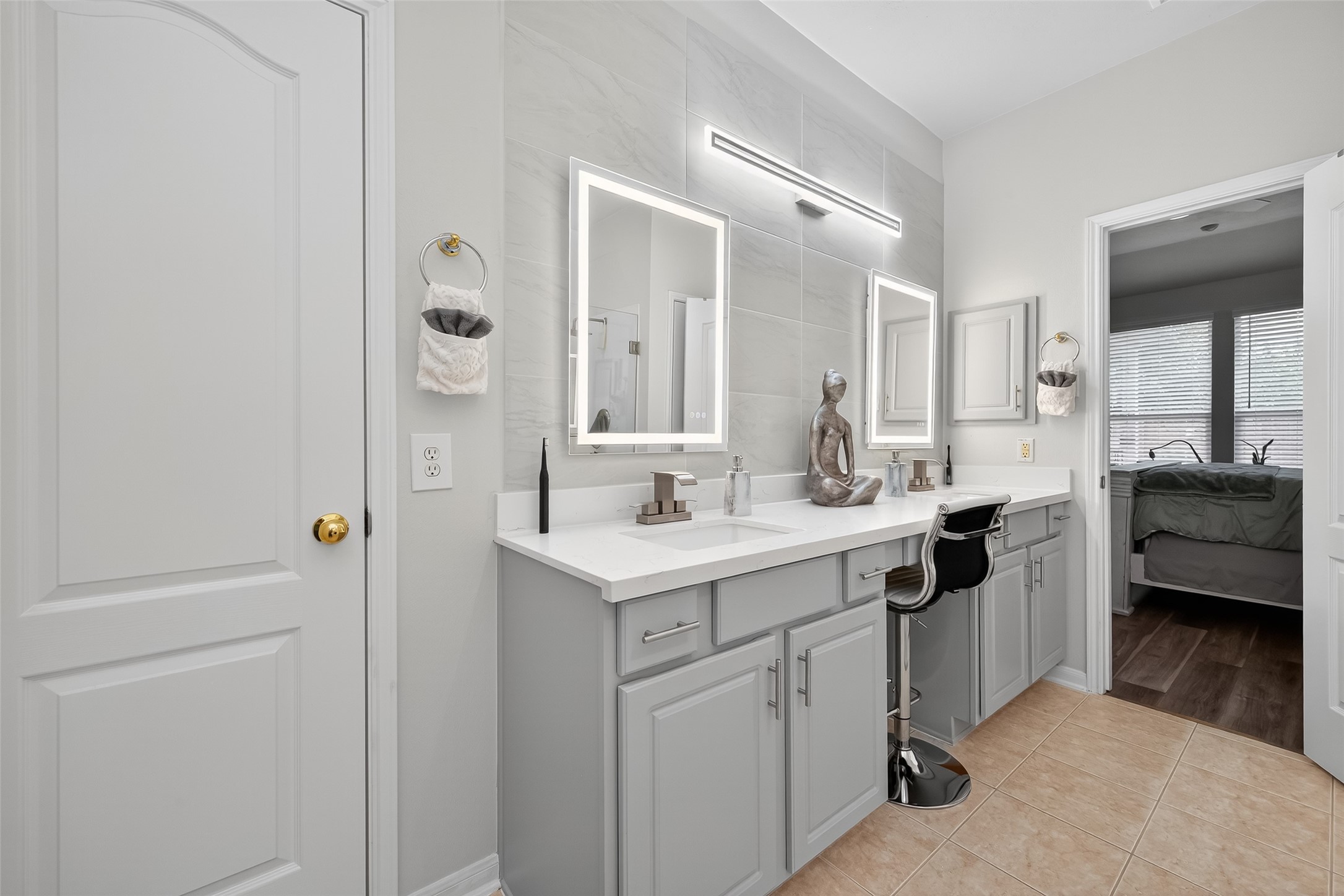 19343 Dickson Park Drive Spring, TX 77373 - Photo 21 of 49 a view of bathroom with a sink a mirror and a shower